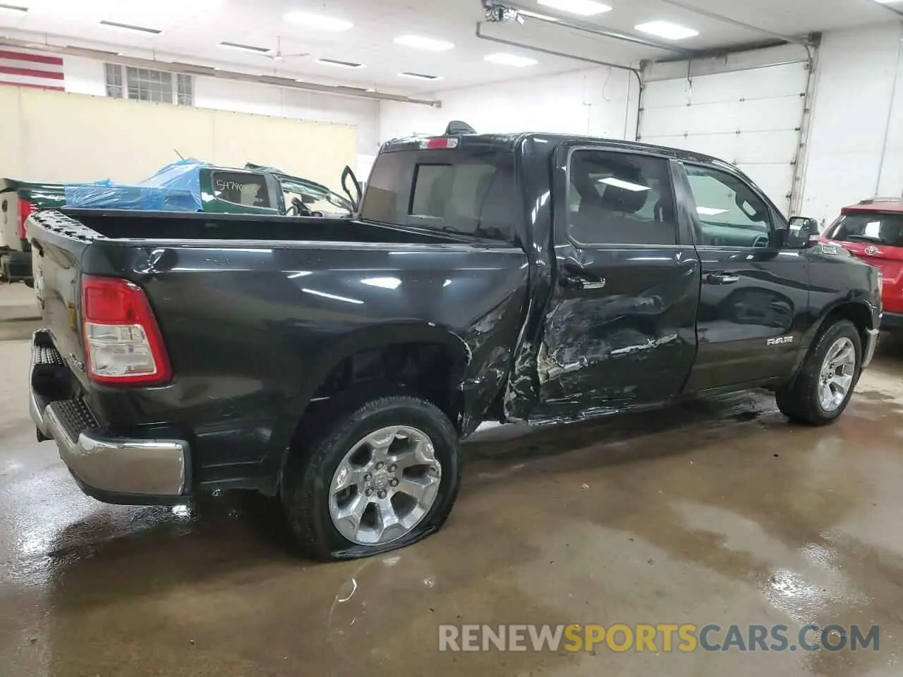 3 Photograph of a damaged car 1C6SRFFT6LN327102 RAM 1500 2020