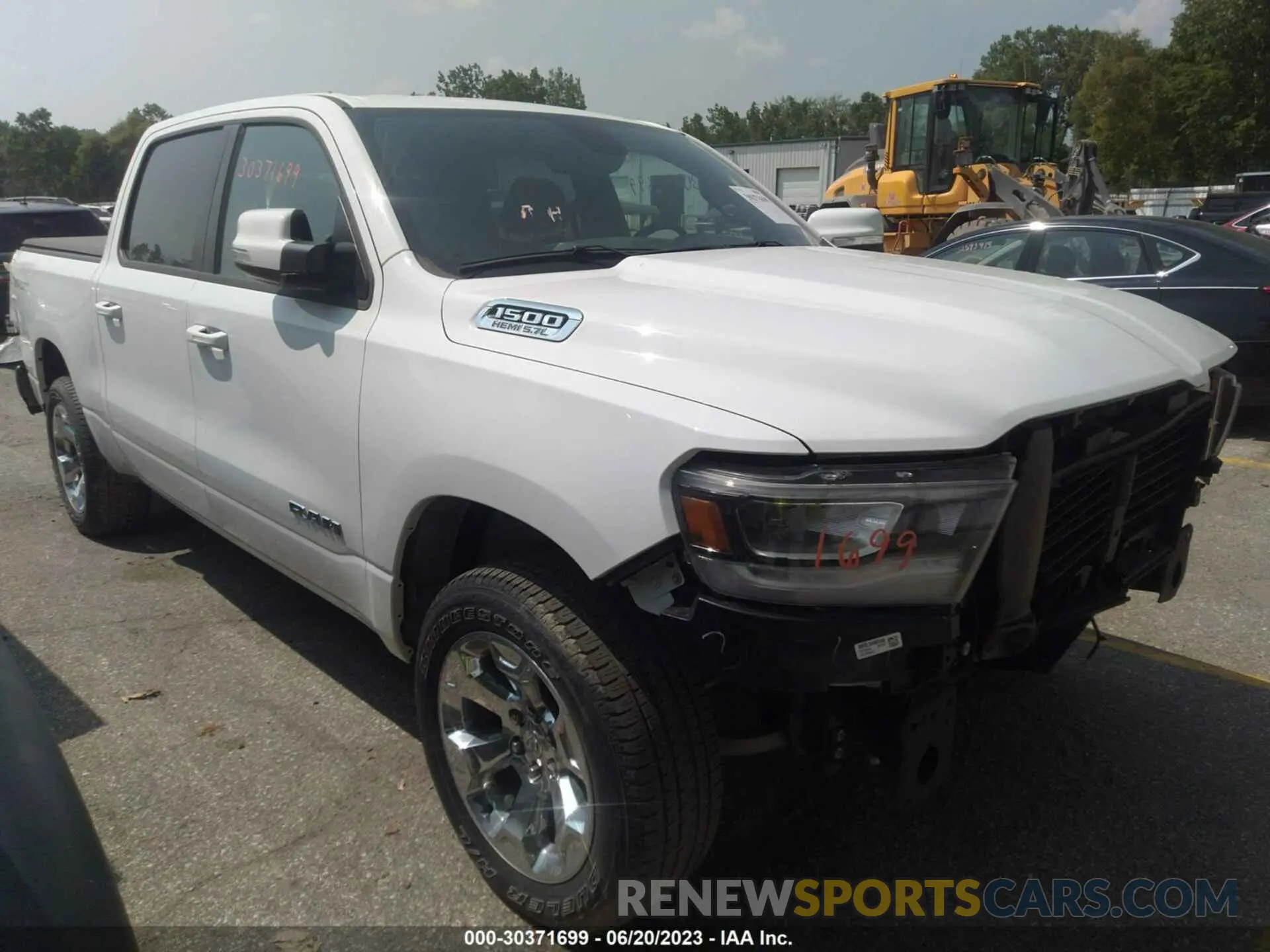 1 Photograph of a damaged car 1C6SRFFT7LN108696 RAM 1500 2020