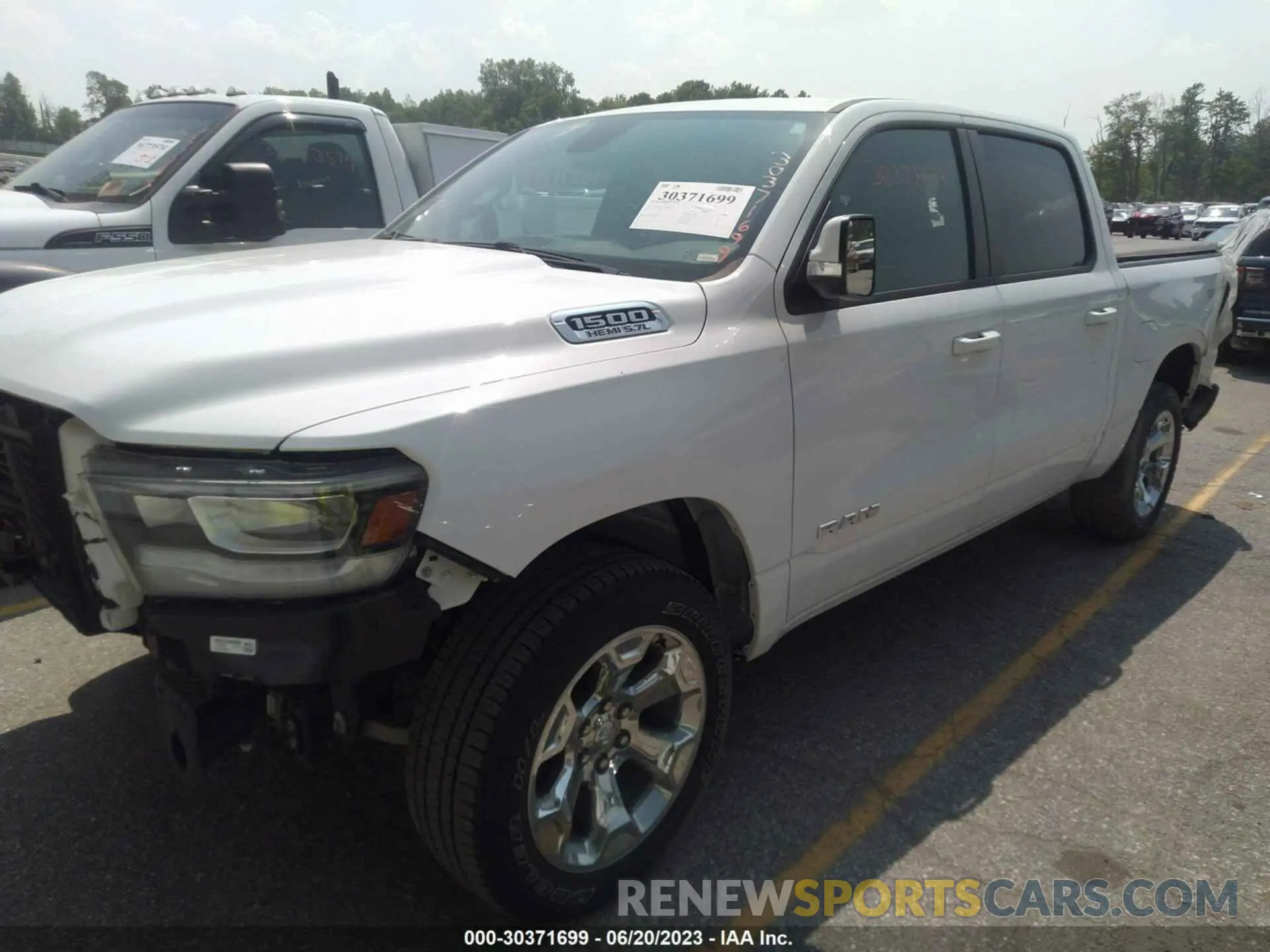2 Photograph of a damaged car 1C6SRFFT7LN108696 RAM 1500 2020