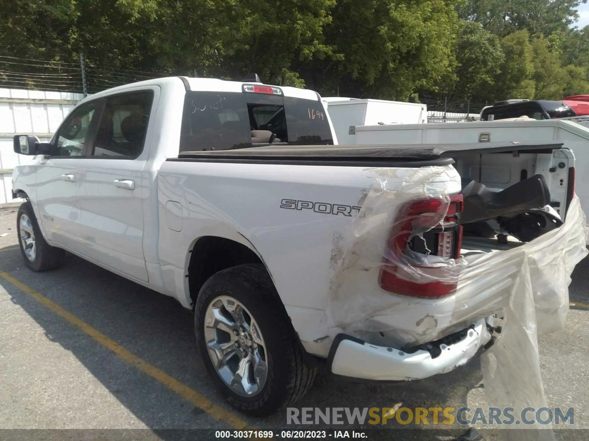 3 Photograph of a damaged car 1C6SRFFT7LN108696 RAM 1500 2020