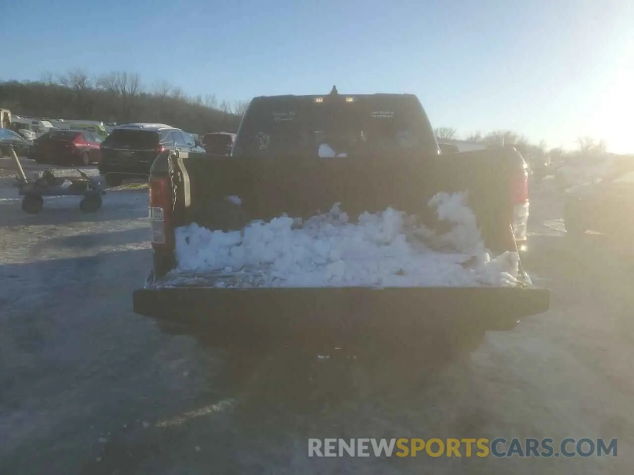6 Photograph of a damaged car 1C6SRFFT7LN115115 RAM 1500 2020