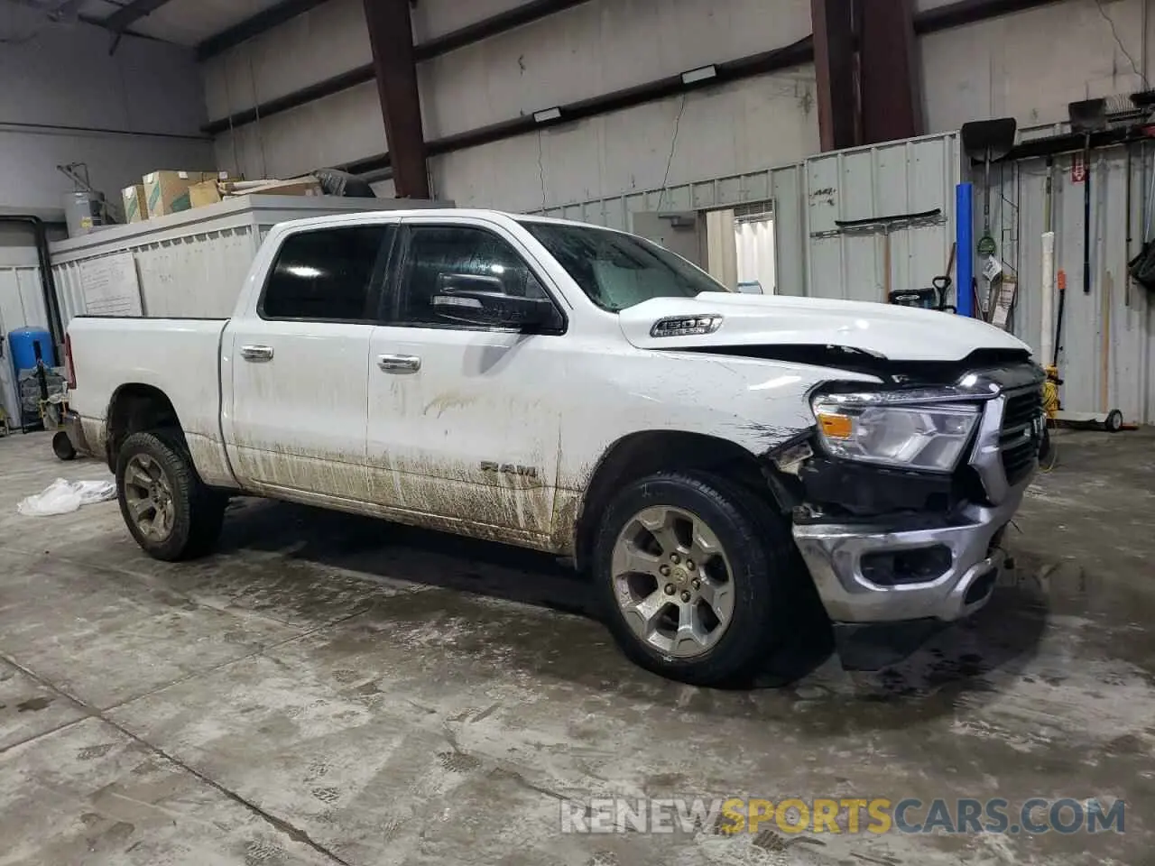 4 Photograph of a damaged car 1C6SRFFT7LN141049 RAM 1500 2020