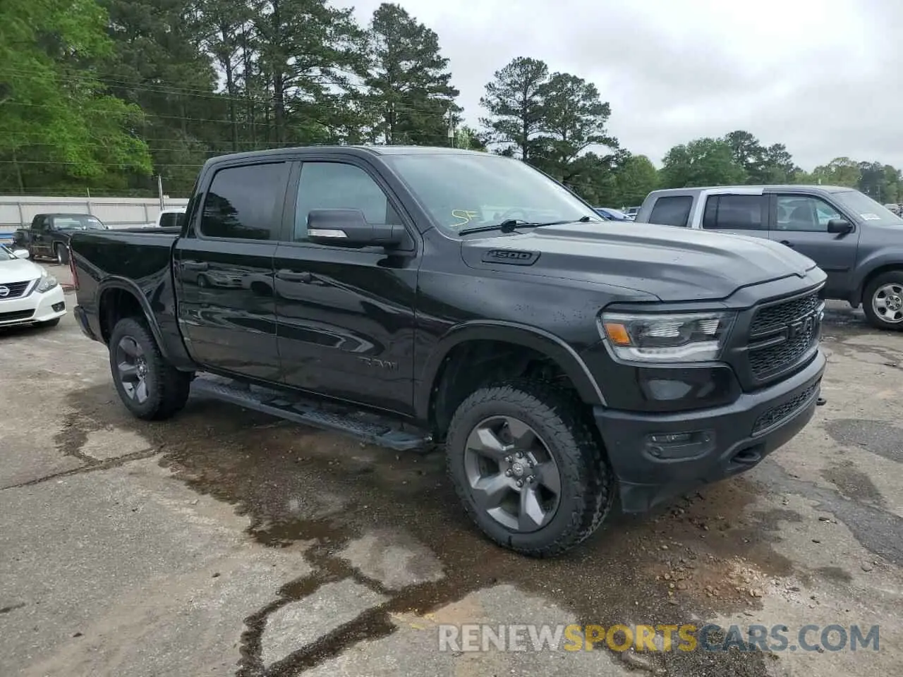4 Photograph of a damaged car 1C6SRFFT7LN265273 RAM 1500 2020