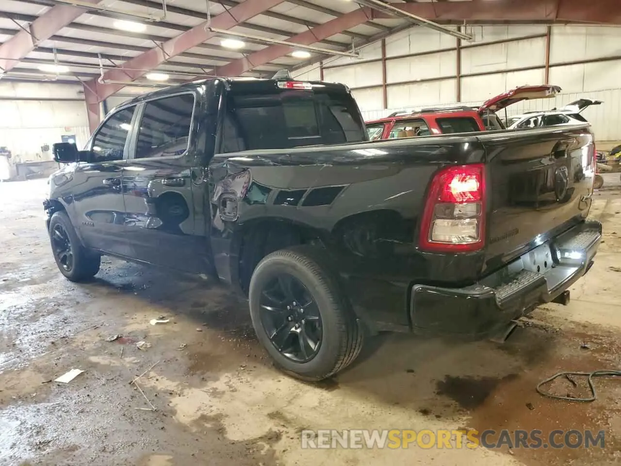 2 Photograph of a damaged car 1C6SRFFT7LN301253 RAM 1500 2020