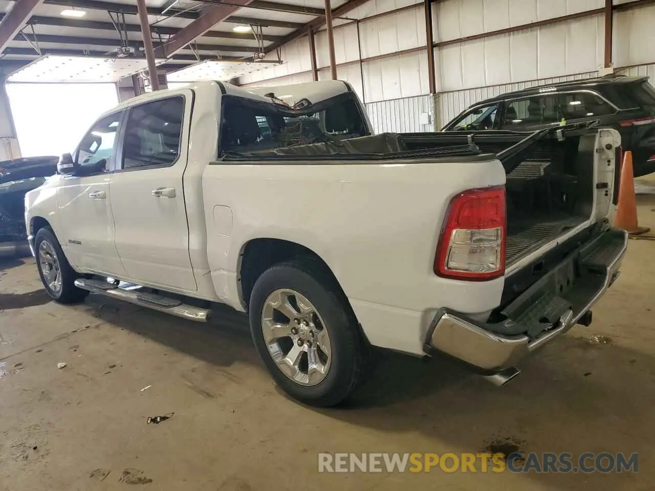 2 Photograph of a damaged car 1C6SRFFT7LN318490 RAM 1500 2020