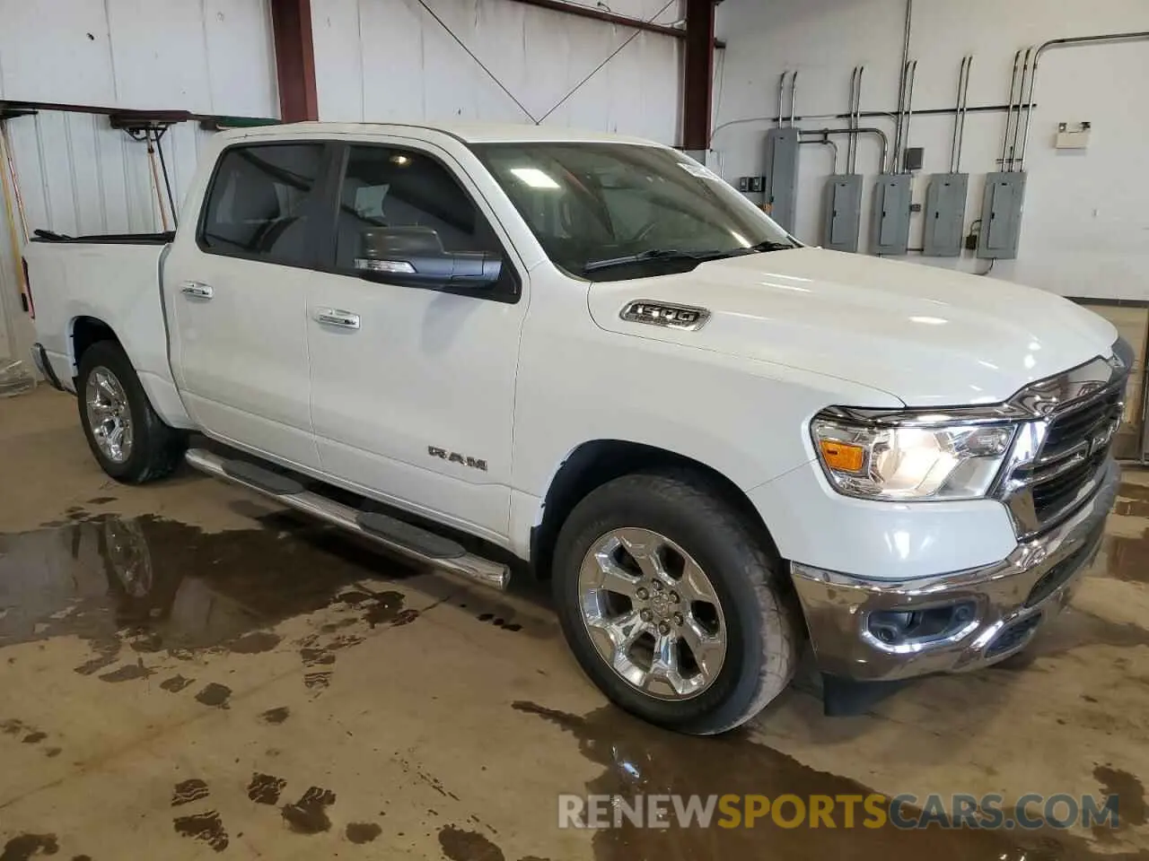 4 Photograph of a damaged car 1C6SRFFT7LN318490 RAM 1500 2020