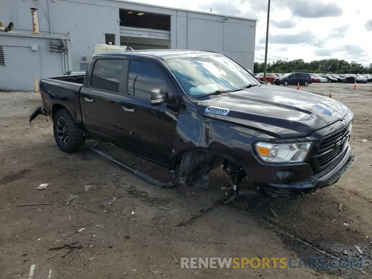 4 Photograph of a damaged car 1C6SRFFT7LN351201 RAM 1500 2020