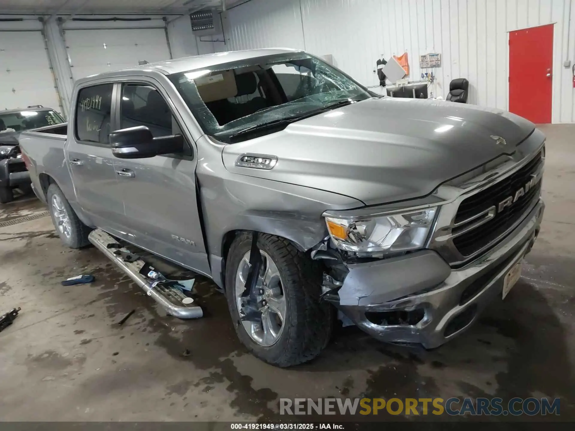 1 Photograph of a damaged car 1C6SRFFT8LN113101 RAM 1500 2020