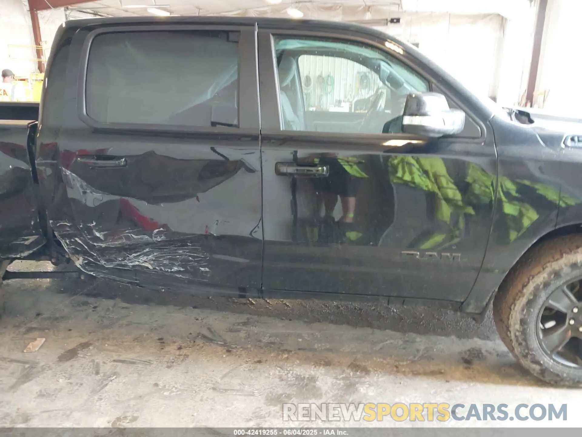 14 Photograph of a damaged car 1C6SRFFT8LN184508 RAM 1500 2020