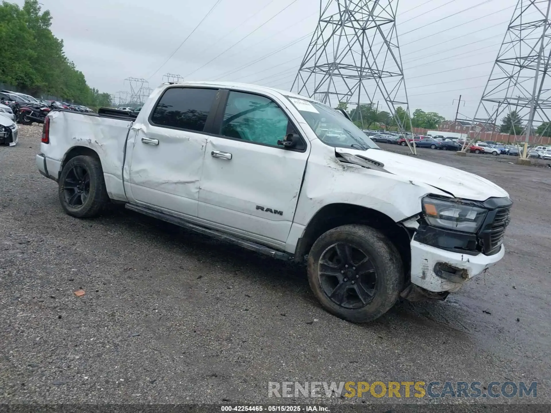 1 Photograph of a damaged car 1C6SRFFT8LN207821 RAM 1500 2020