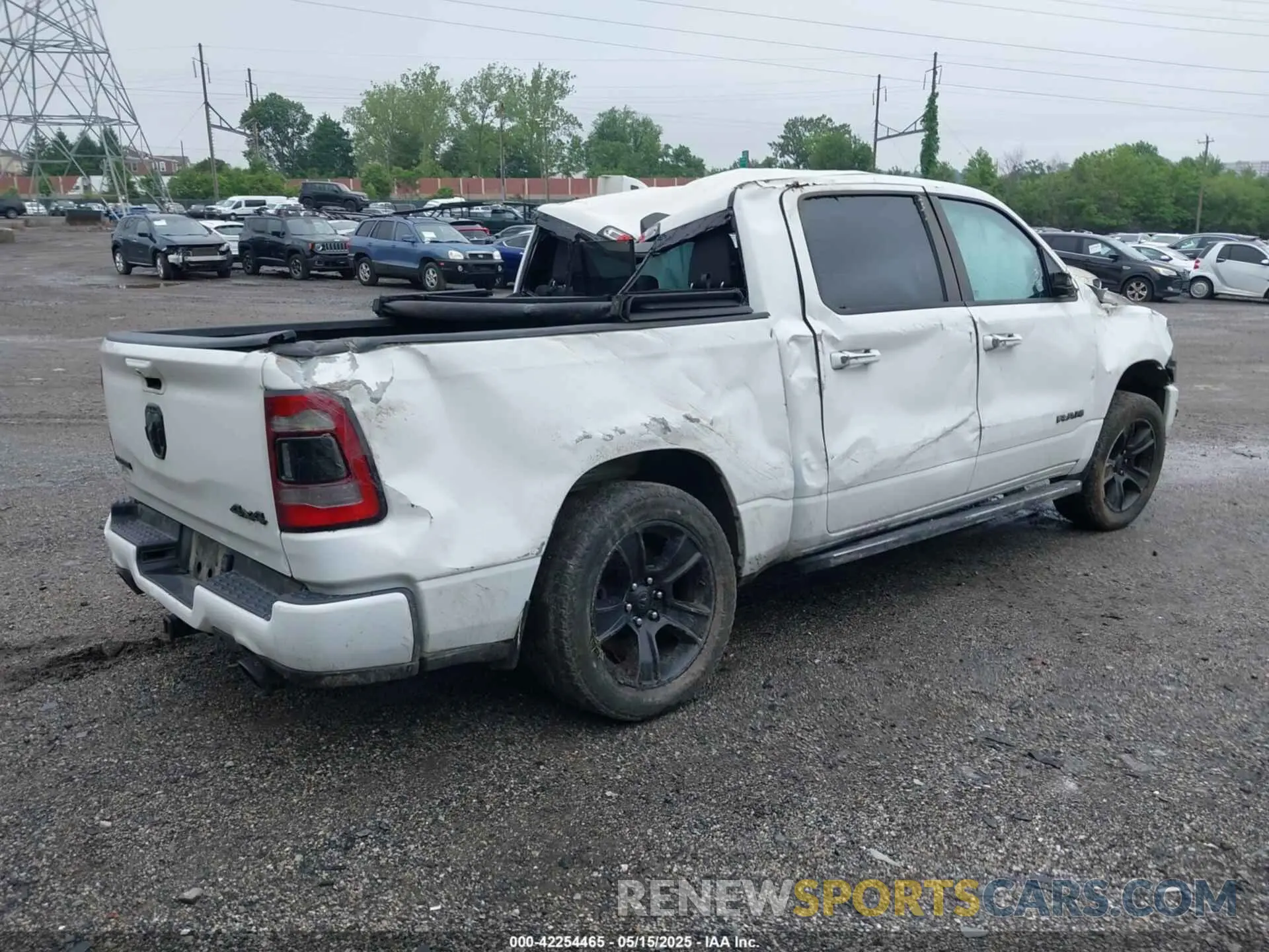 4 Photograph of a damaged car 1C6SRFFT8LN207821 RAM 1500 2020
