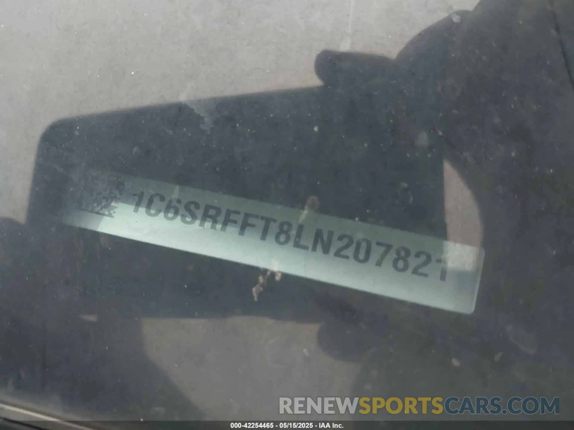 9 Photograph of a damaged car 1C6SRFFT8LN207821 RAM 1500 2020