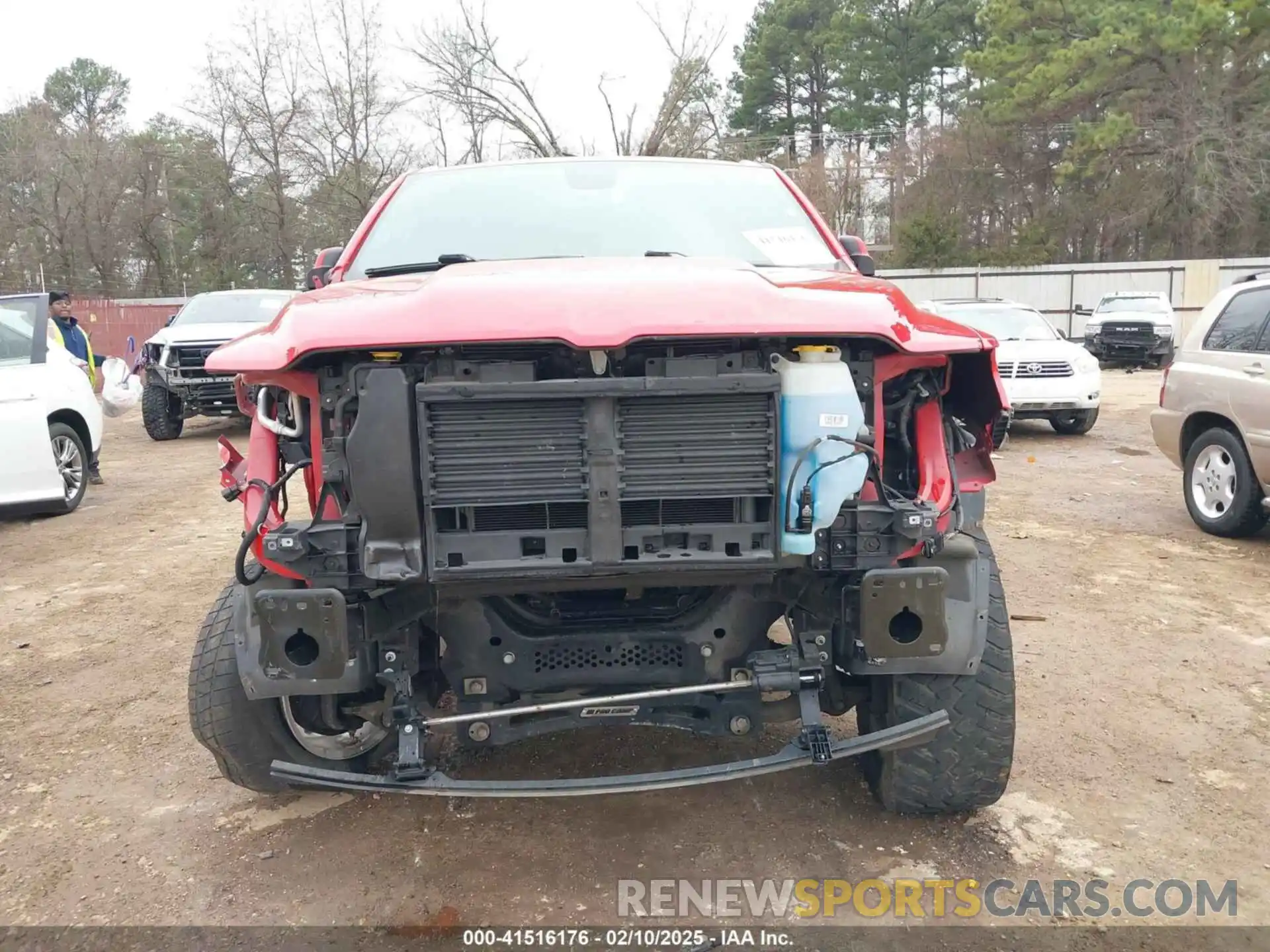 13 Photograph of a damaged car 1C6SRFFT8LN284642 RAM 1500 2020