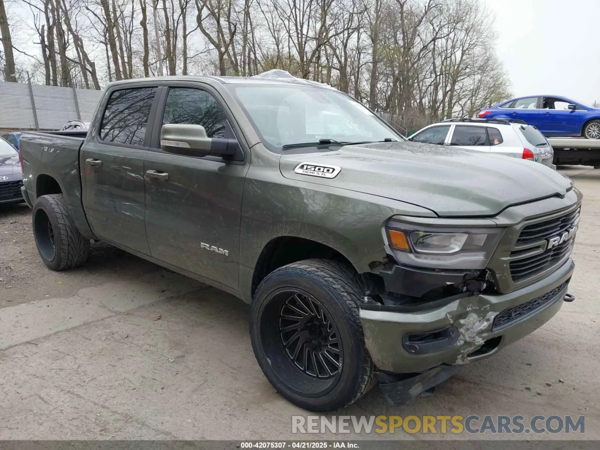 1 Photograph of a damaged car 1C6SRFFT8LN326825 RAM 1500 2020