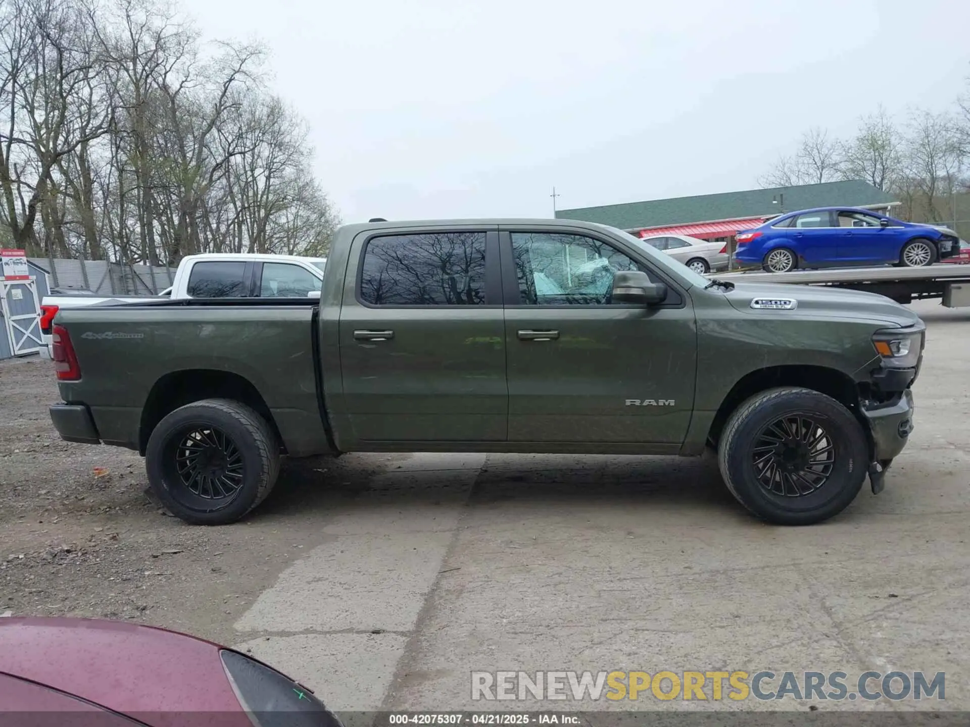 14 Photograph of a damaged car 1C6SRFFT8LN326825 RAM 1500 2020