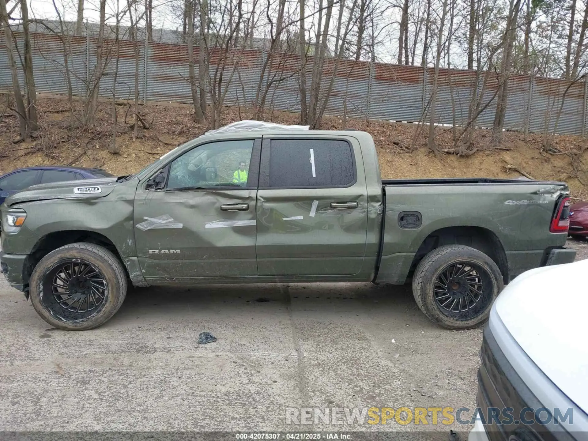 15 Photograph of a damaged car 1C6SRFFT8LN326825 RAM 1500 2020