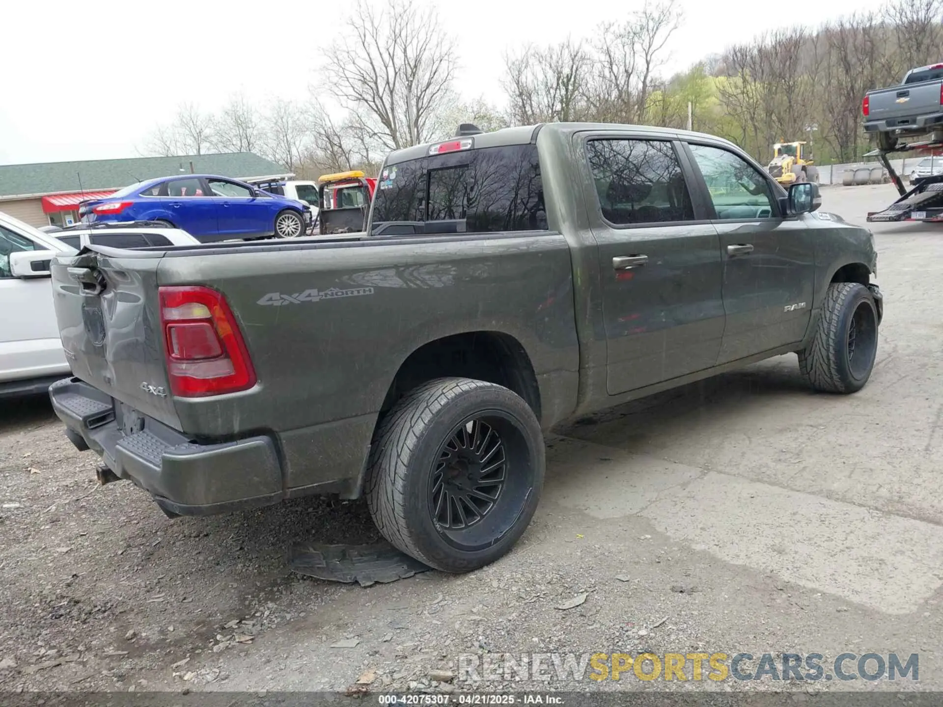 4 Photograph of a damaged car 1C6SRFFT8LN326825 RAM 1500 2020