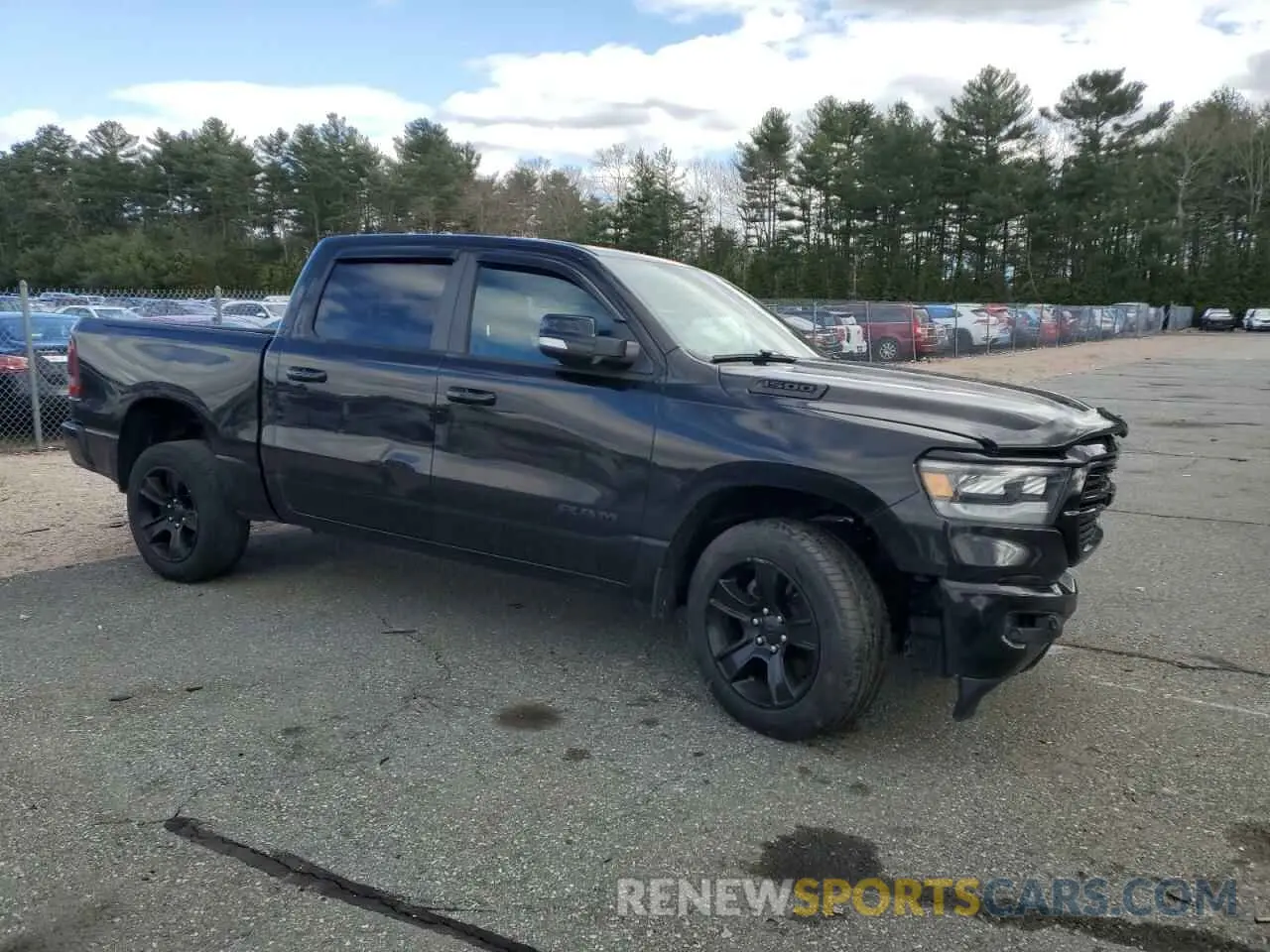 4 Photograph of a damaged car 1C6SRFFT8LN330325 RAM 1500 2020