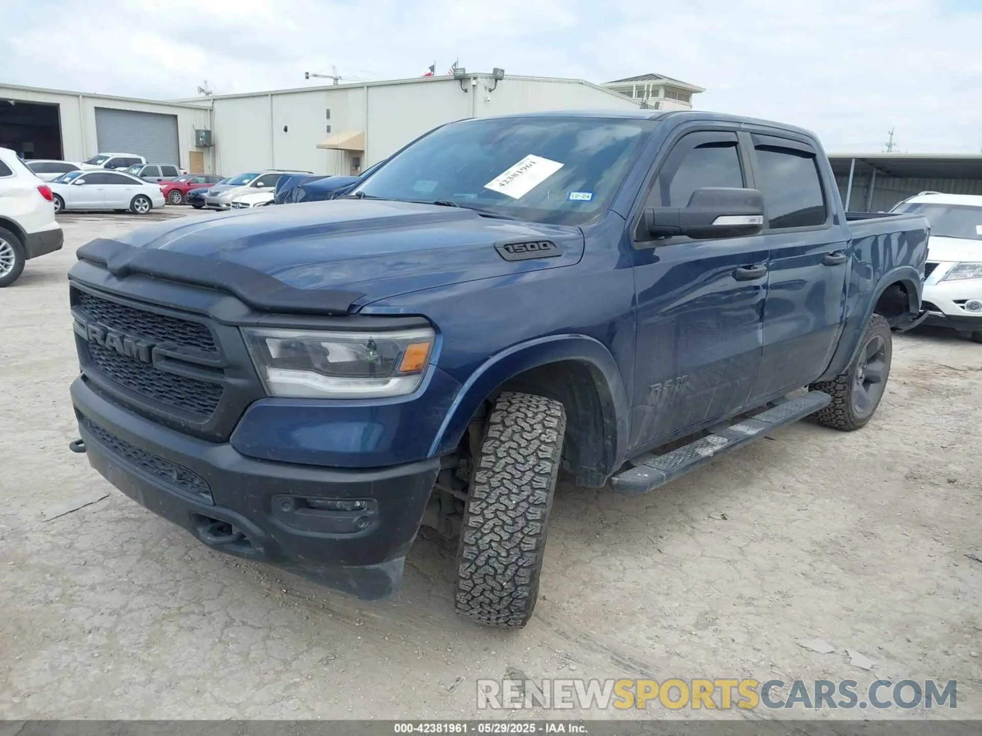 2 Photograph of a damaged car 1C6SRFFT8LN387625 RAM 1500 2020