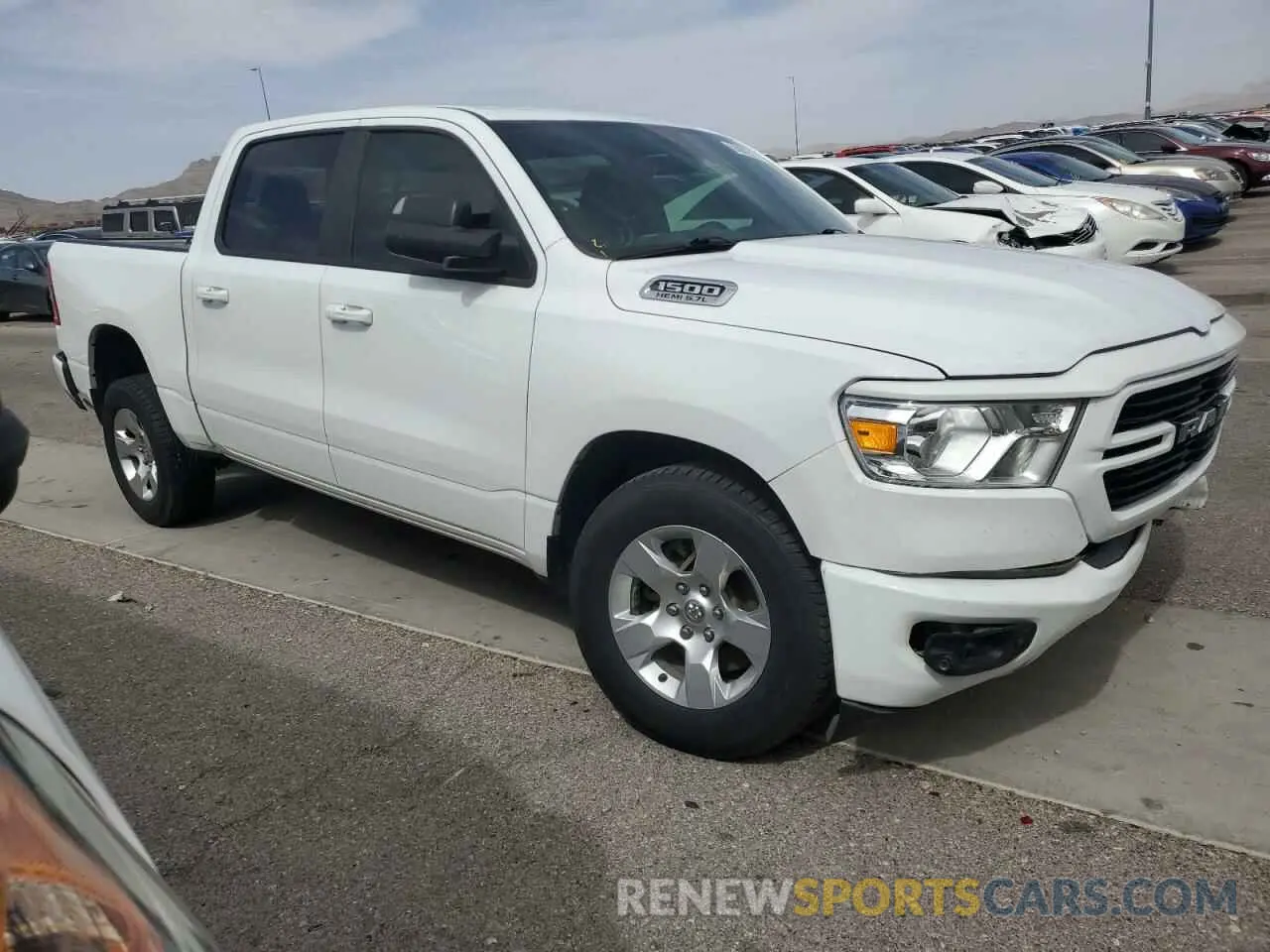 4 Photograph of a damaged car 1C6SRFFT8LN397491 RAM 1500 2020