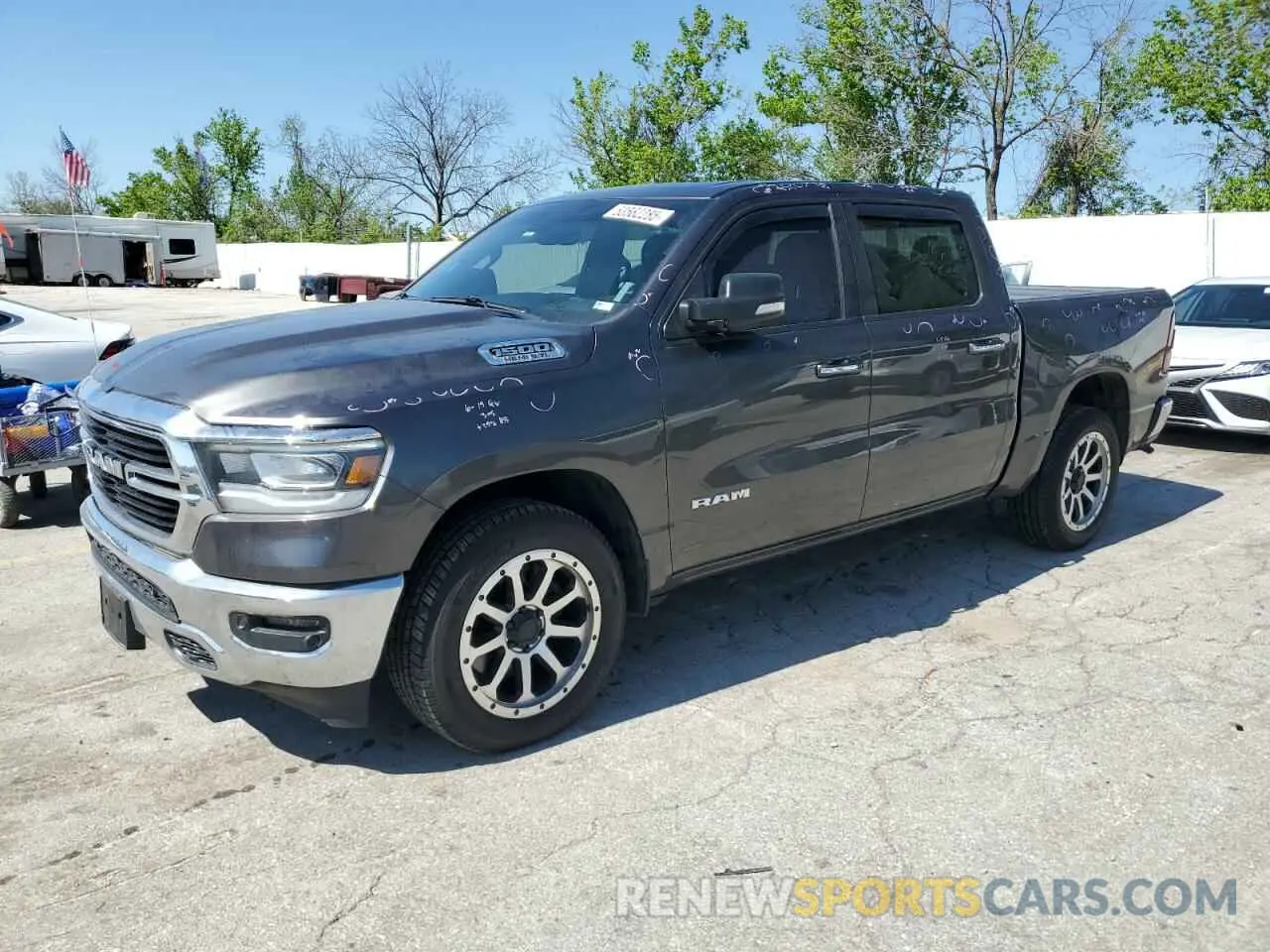 1 Photograph of a damaged car 1C6SRFFT9LN364080 RAM 1500 2020