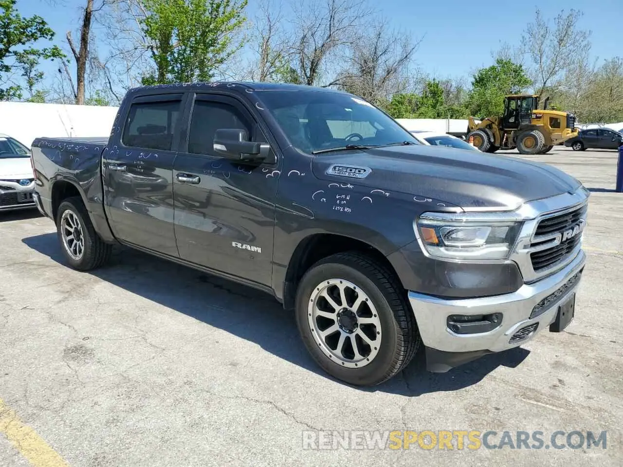 4 Photograph of a damaged car 1C6SRFFT9LN364080 RAM 1500 2020