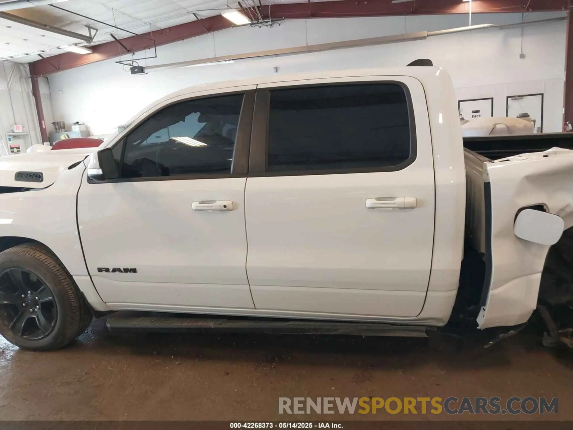 14 Photograph of a damaged car 1C6SRFFTXLN241064 RAM 1500 2020