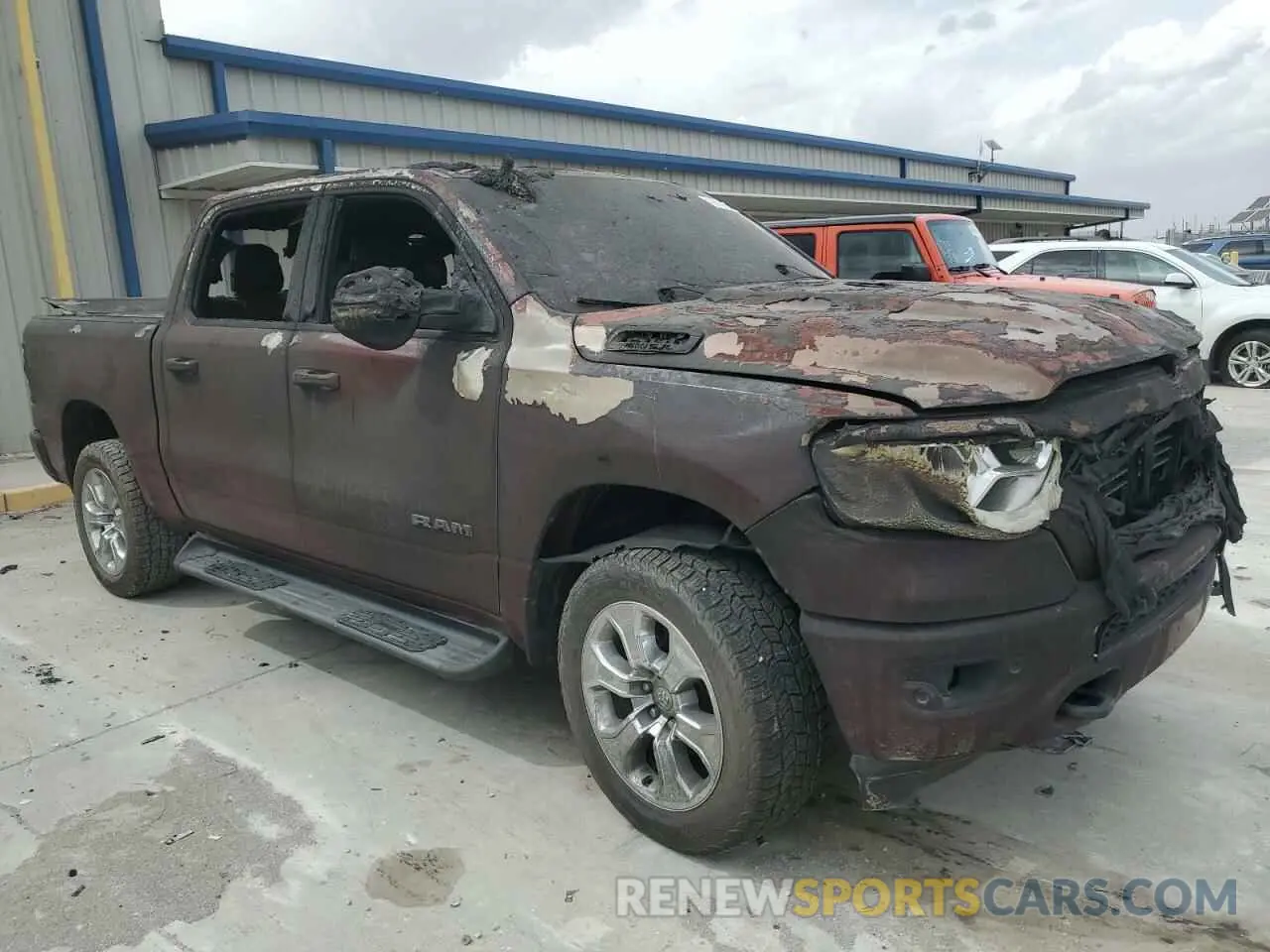 4 Photograph of a damaged car 1C6SRFFTXLN264909 RAM 1500 2020