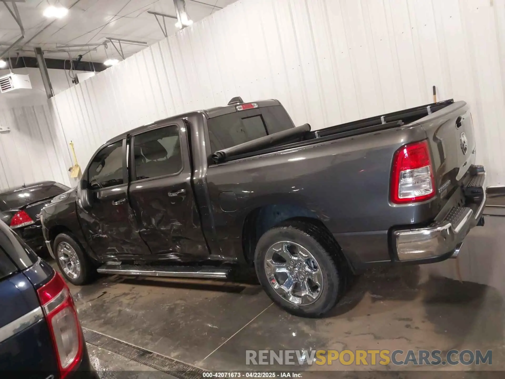 14 Photograph of a damaged car 1C6SRFFTXLN359454 RAM 1500 2020