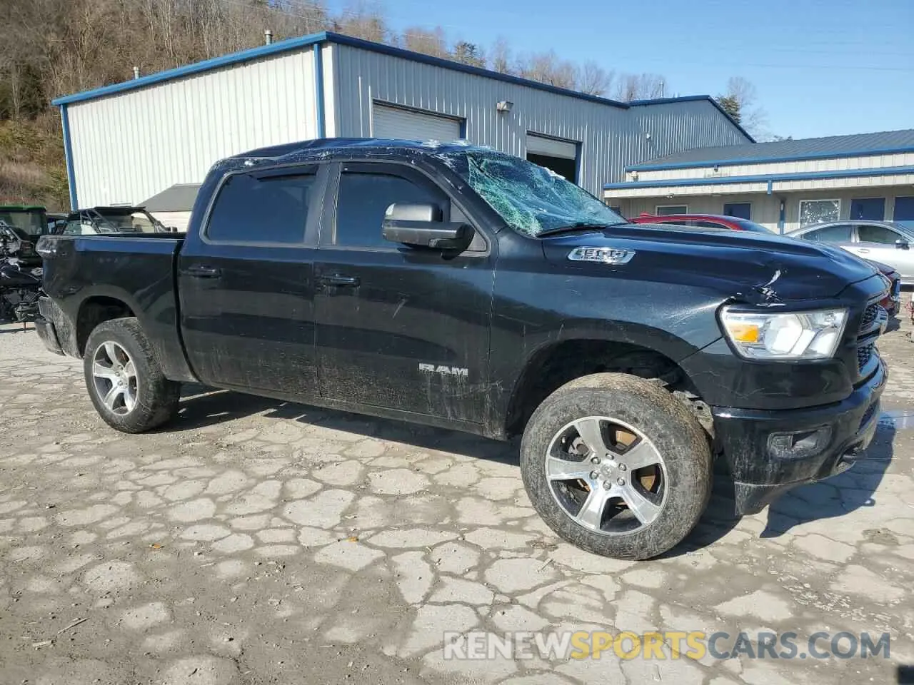 4 Photograph of a damaged car 1C6SRFGT1LN117327 RAM 1500 2020
