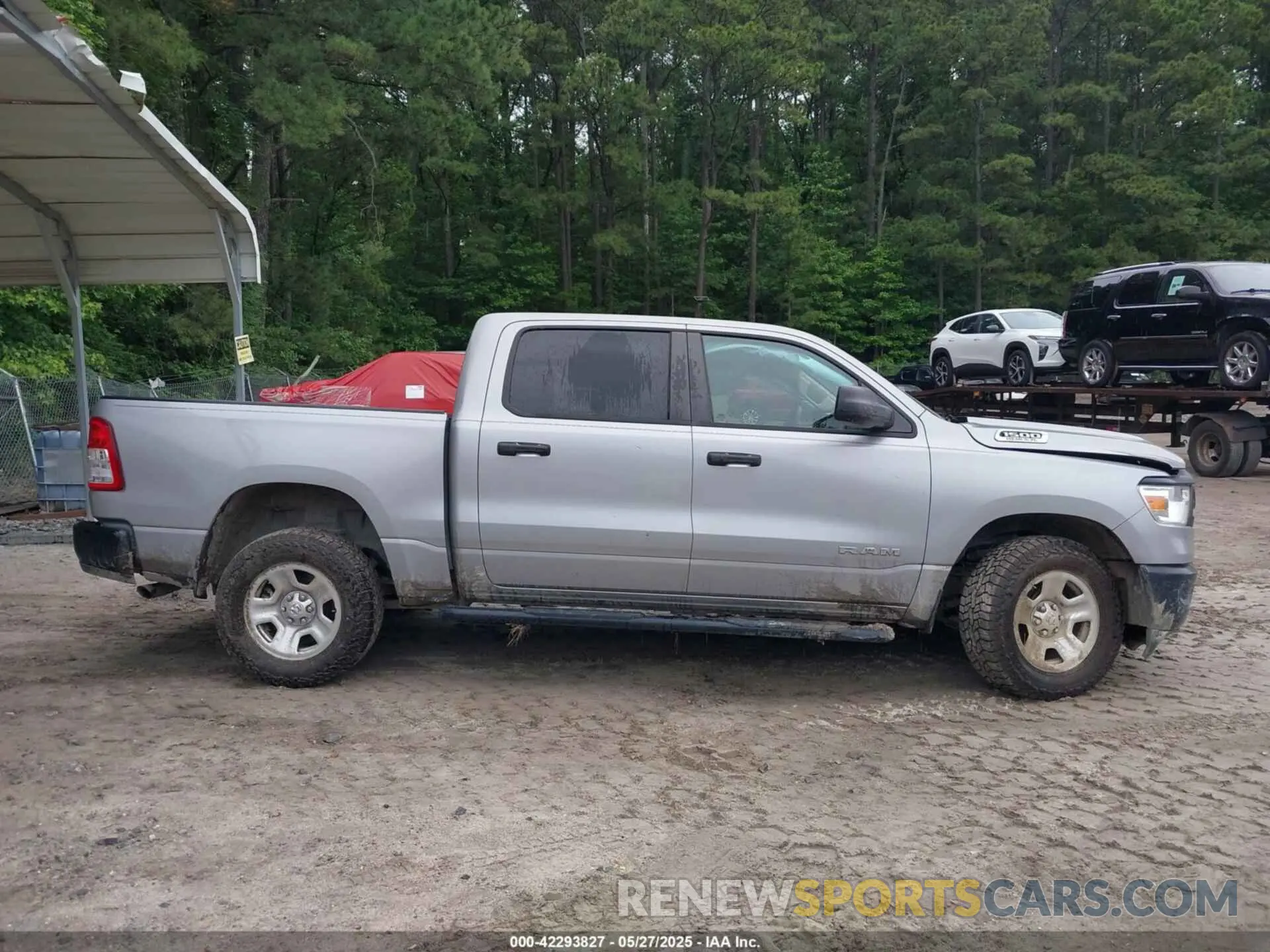 13 Photograph of a damaged car 1C6SRFGT3LN151043 RAM 1500 2020