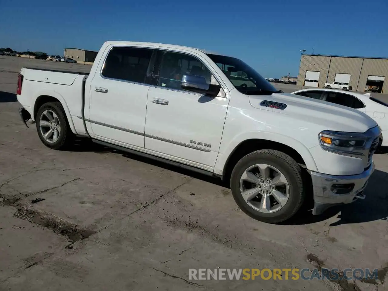 4 Photograph of a damaged car 1C6SRFHMXLN303441 RAM 1500 2020