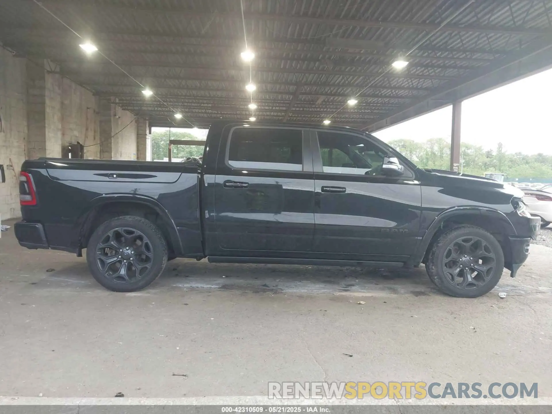 14 Photograph of a damaged car 1C6SRFHT2LN147306 RAM 1500 2020