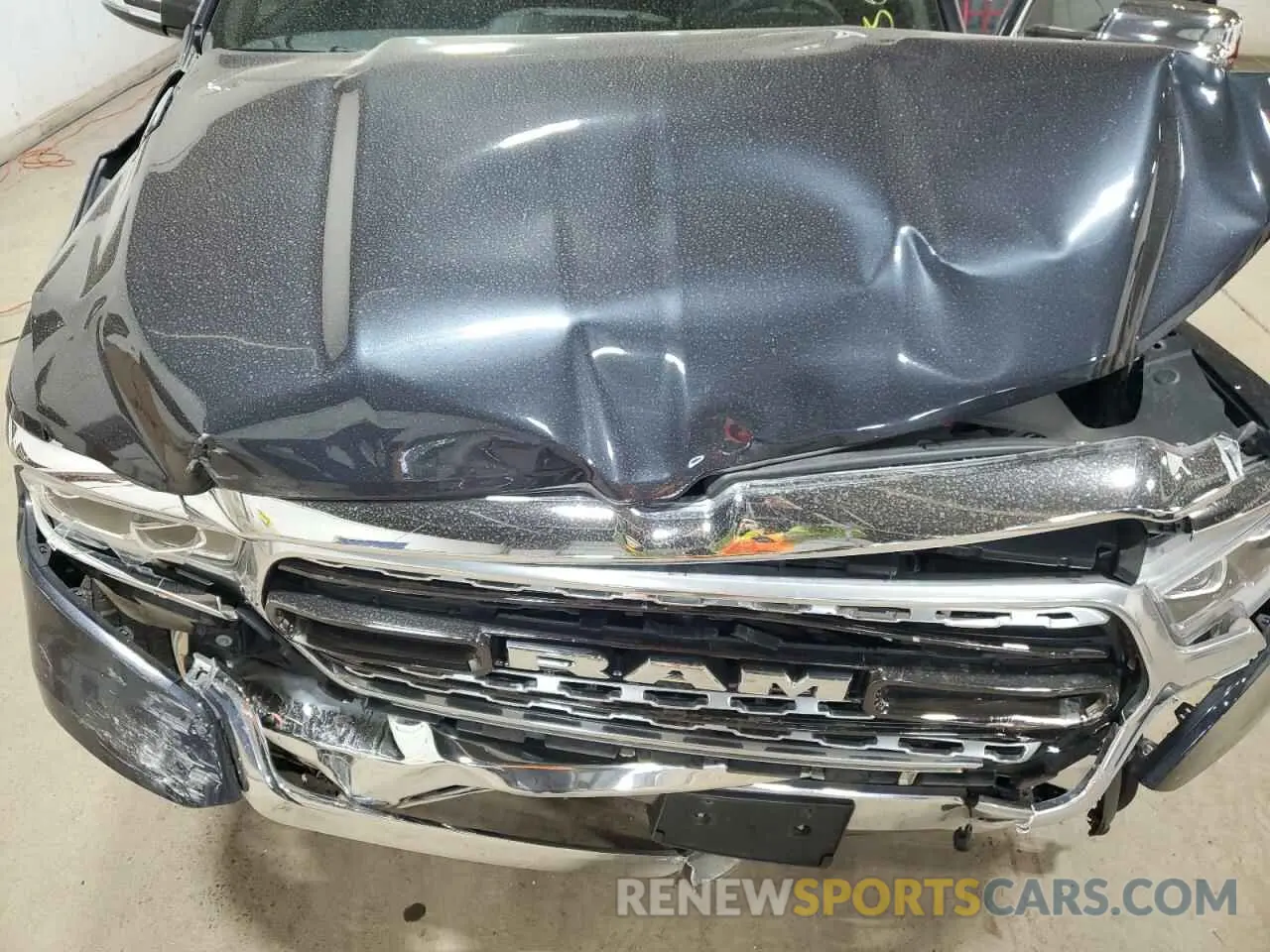 13 Photograph of a damaged car 1C6SRFHT2LN288344 RAM 1500 2020