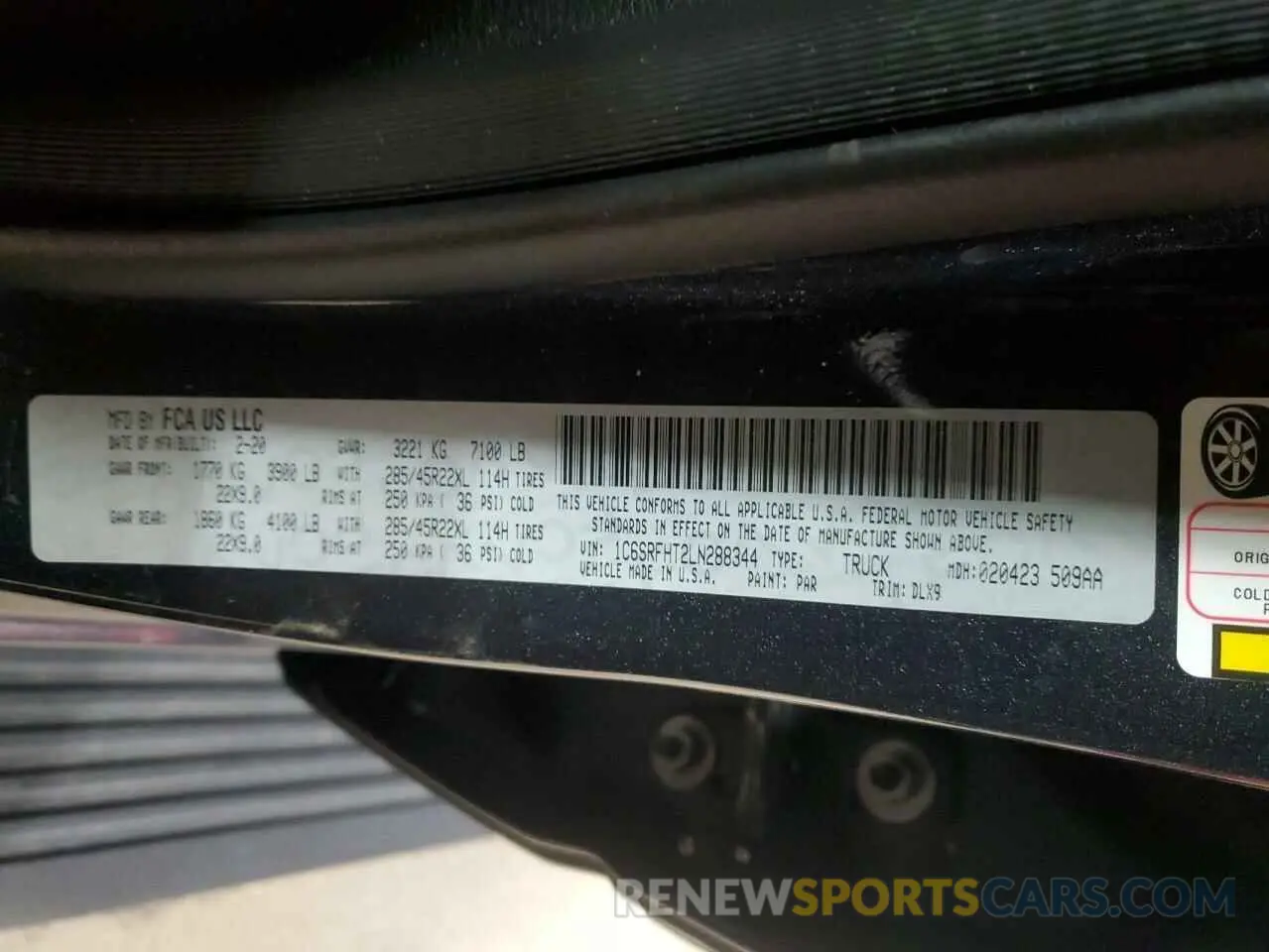 14 Photograph of a damaged car 1C6SRFHT2LN288344 RAM 1500 2020
