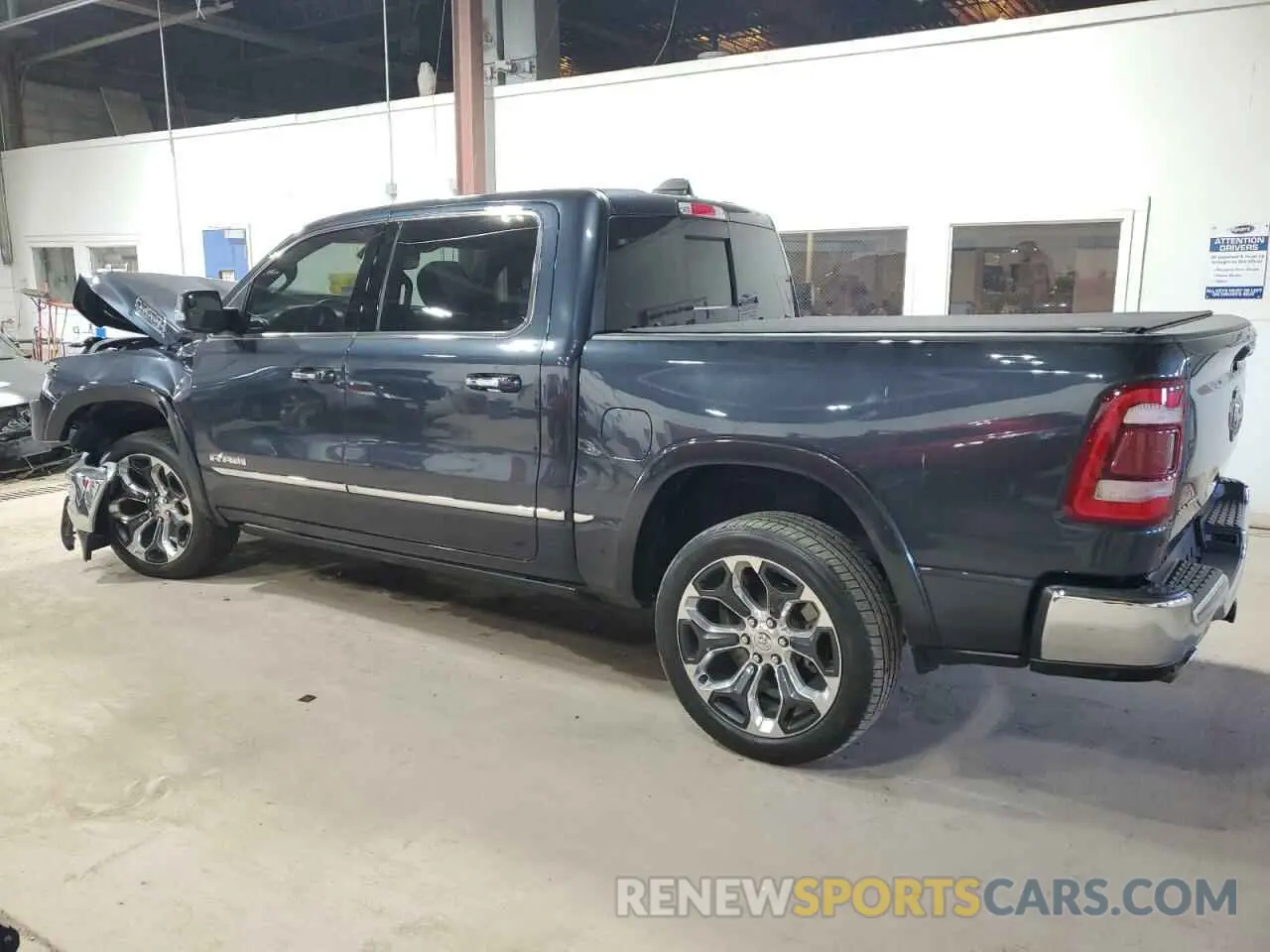 2 Photograph of a damaged car 1C6SRFHT2LN288344 RAM 1500 2020