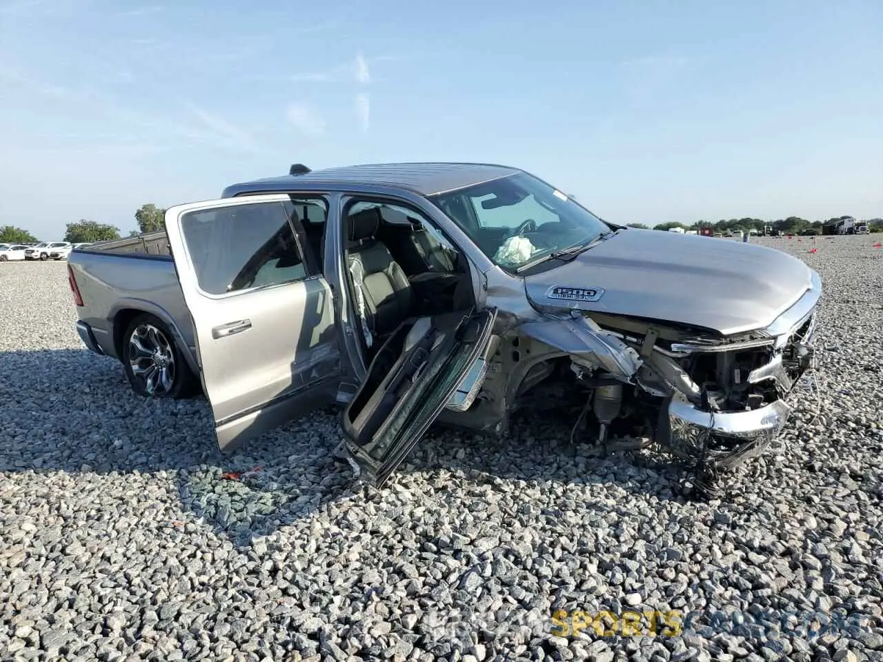 4 Photograph of a damaged car 1C6SRFHT4LN417670 RAM 1500 2020