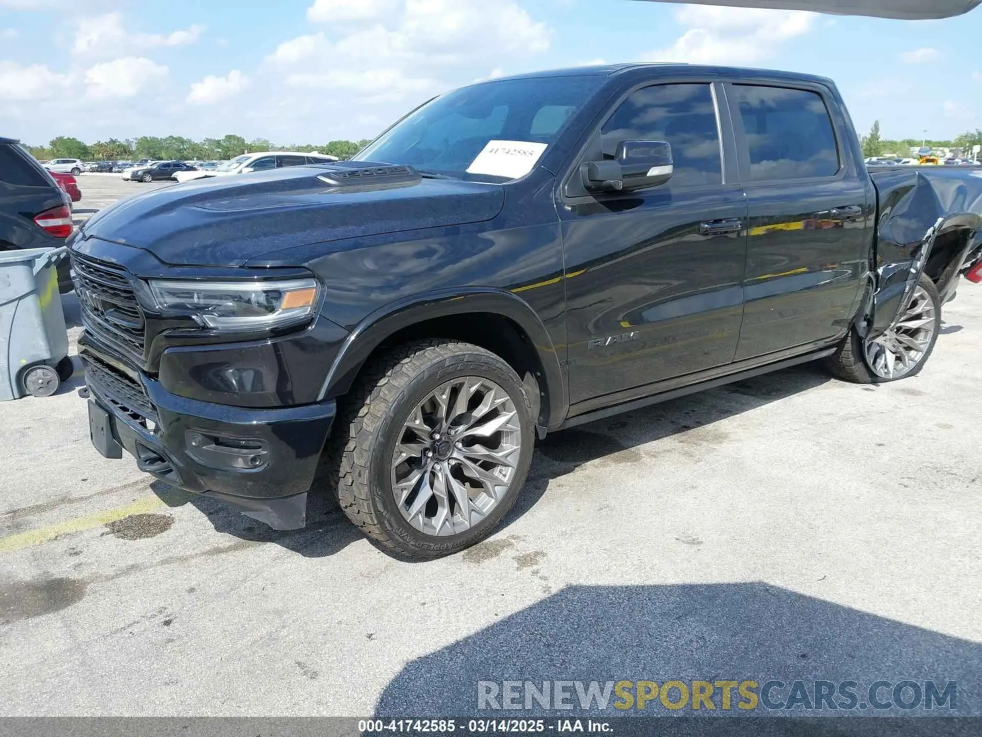 2 Photograph of a damaged car 1C6SRFHT6LN213906 RAM 1500 2020