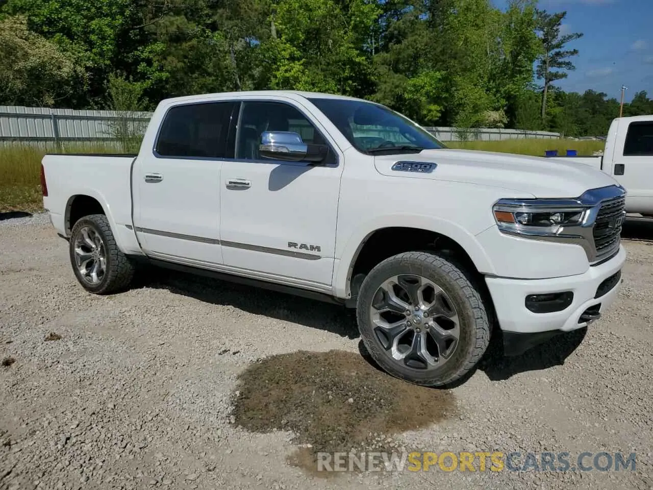 4 Photograph of a damaged car 1C6SRFHT8LN292253 RAM 1500 2020