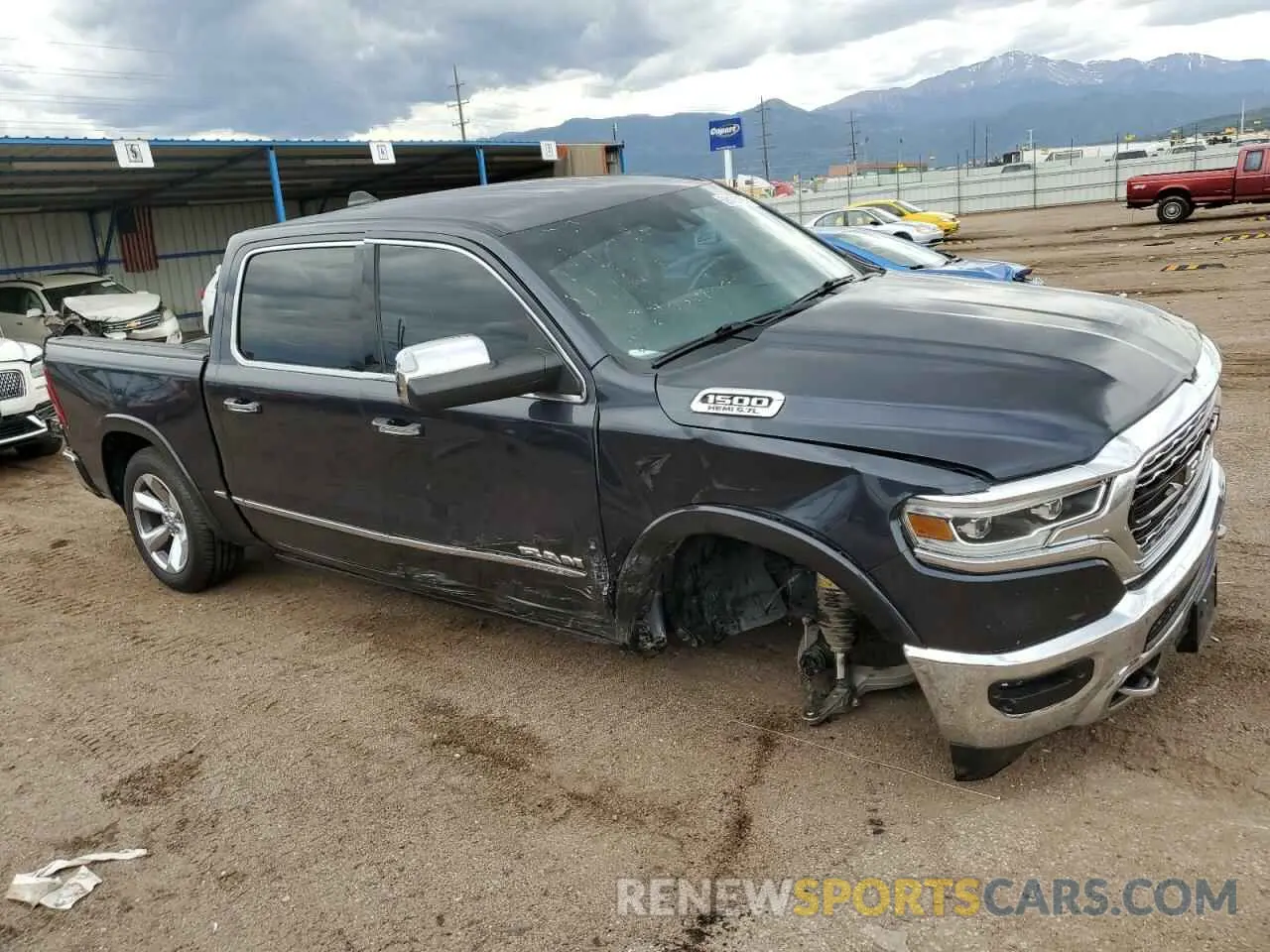 4 Photograph of a damaged car 1C6SRFHT9LN404414 RAM 1500 2020