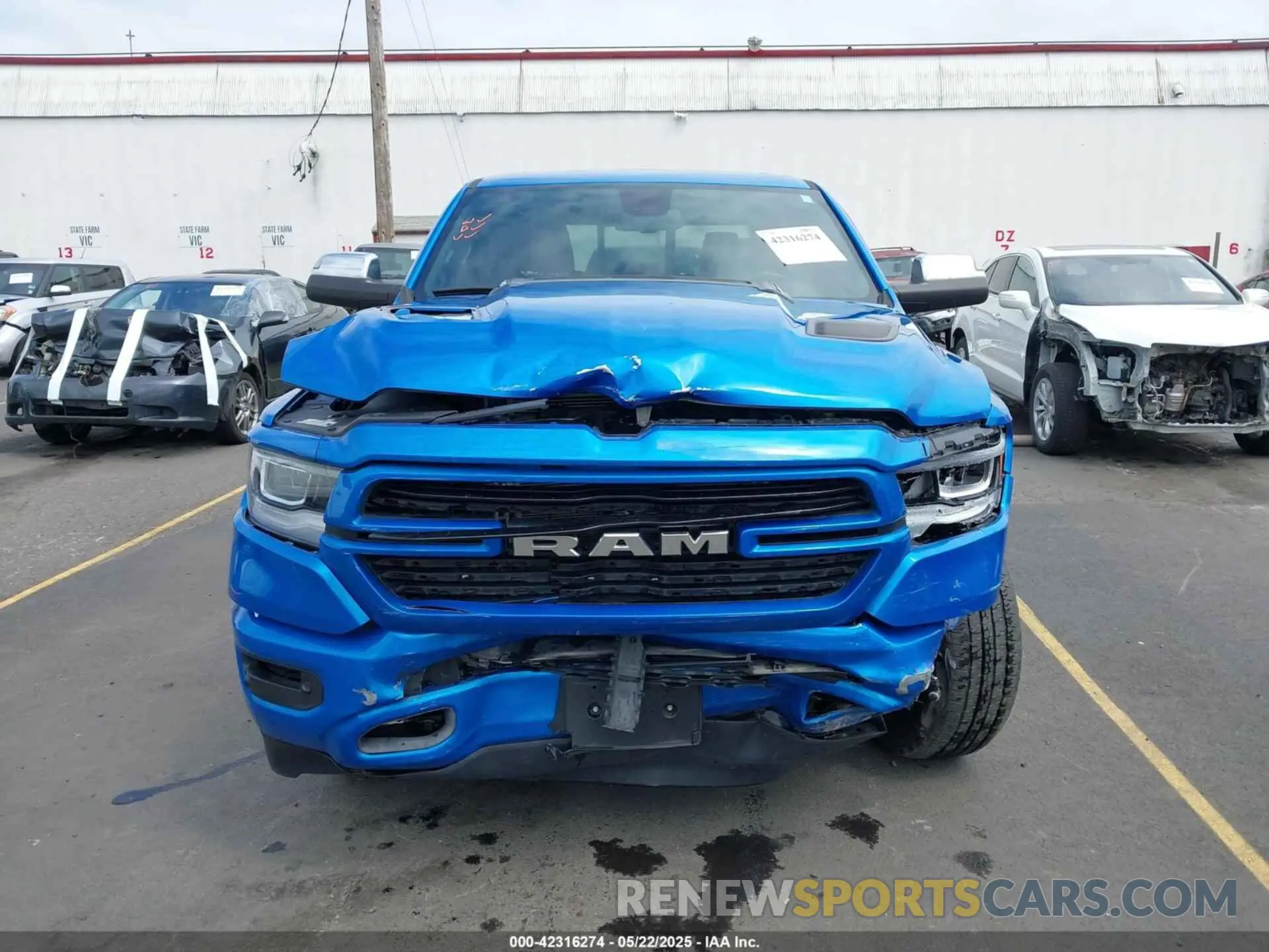 12 Photograph of a damaged car 1C6SRFJM8LN343494 RAM 1500 2020