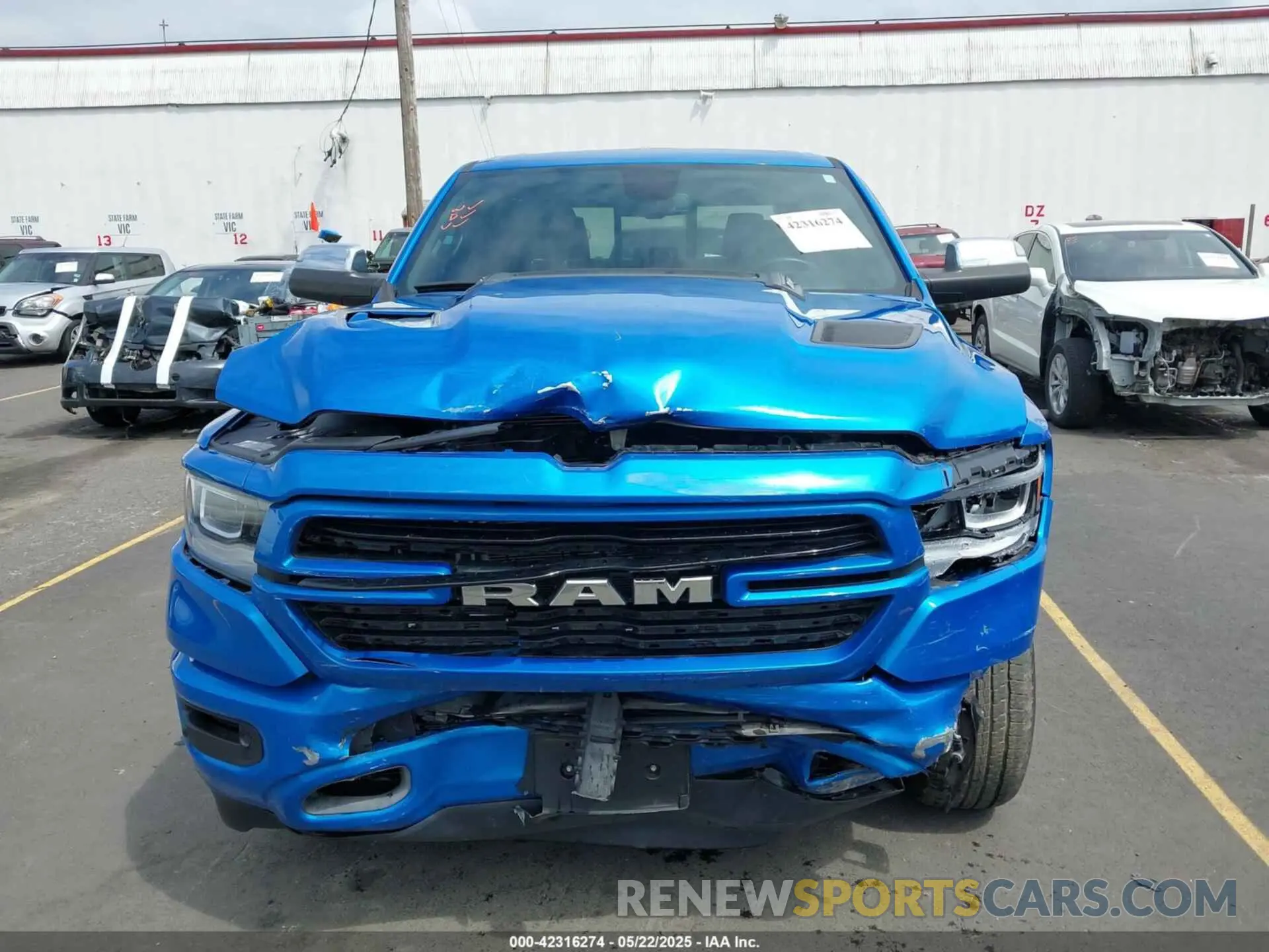 6 Photograph of a damaged car 1C6SRFJM8LN343494 RAM 1500 2020