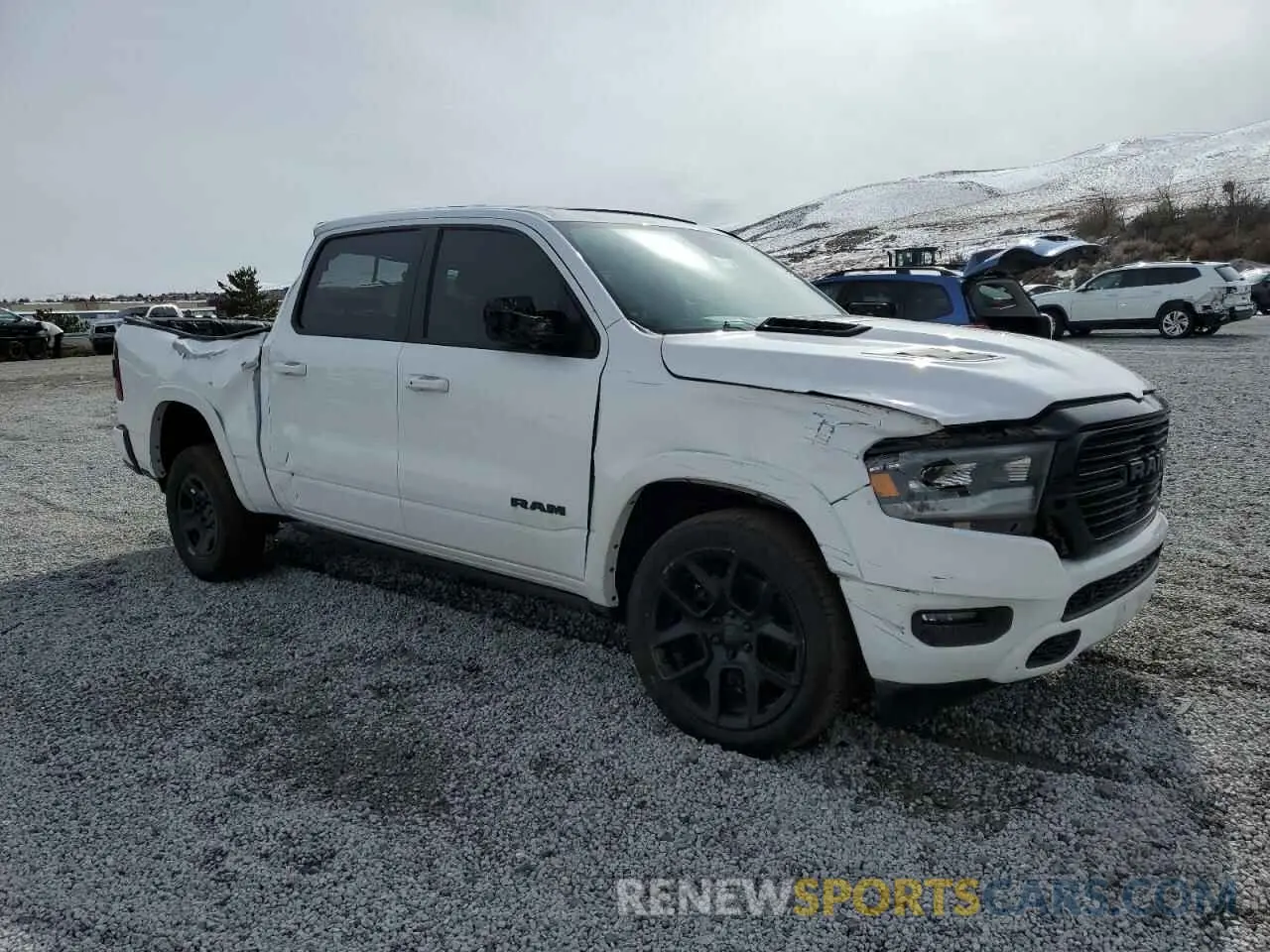 4 Photograph of a damaged car 1C6SRFJM9LN217208 RAM 1500 2020