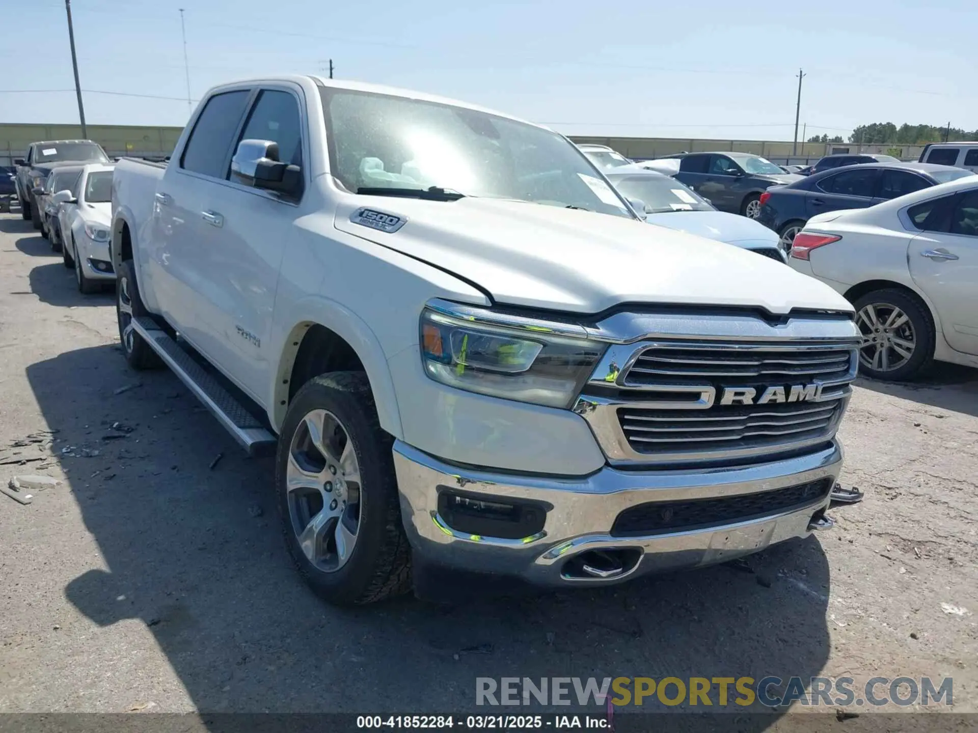 1 Photograph of a damaged car 1C6SRFJT0LN151641 RAM 1500 2020