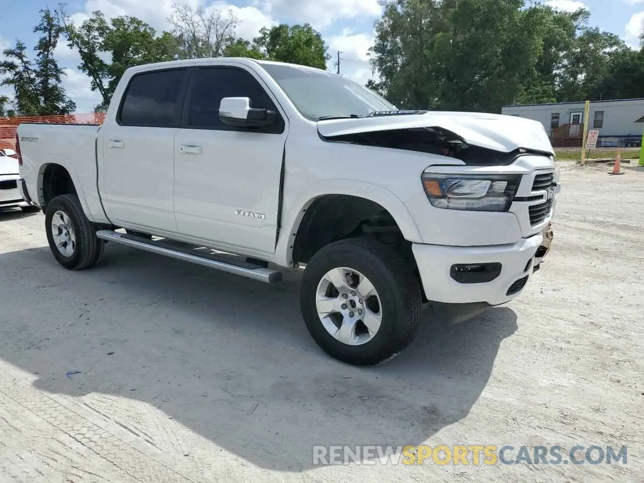 4 Photograph of a damaged car 1C6SRFJT1LN296722 RAM 1500 2020