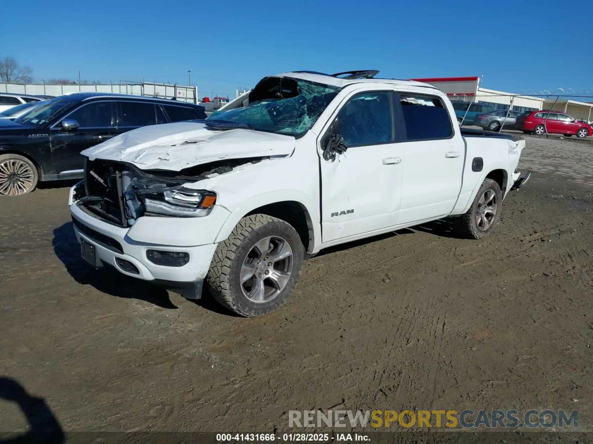 2 Photograph of a damaged car 1C6SRFJT2LN196015 RAM 1500 2020