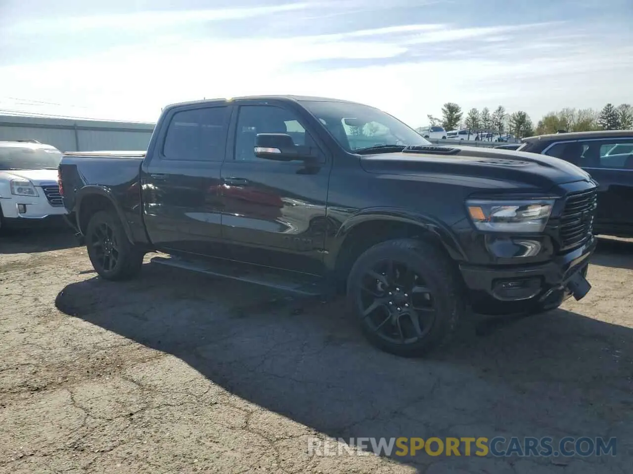 4 Photograph of a damaged car 1C6SRFJT3LN374448 RAM 1500 2020