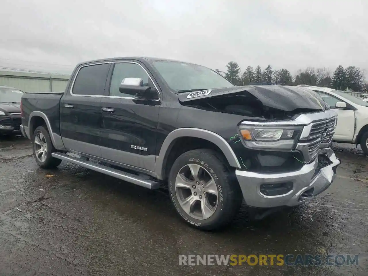 4 Photograph of a damaged car 1C6SRFJT4LN207404 RAM 1500 2020