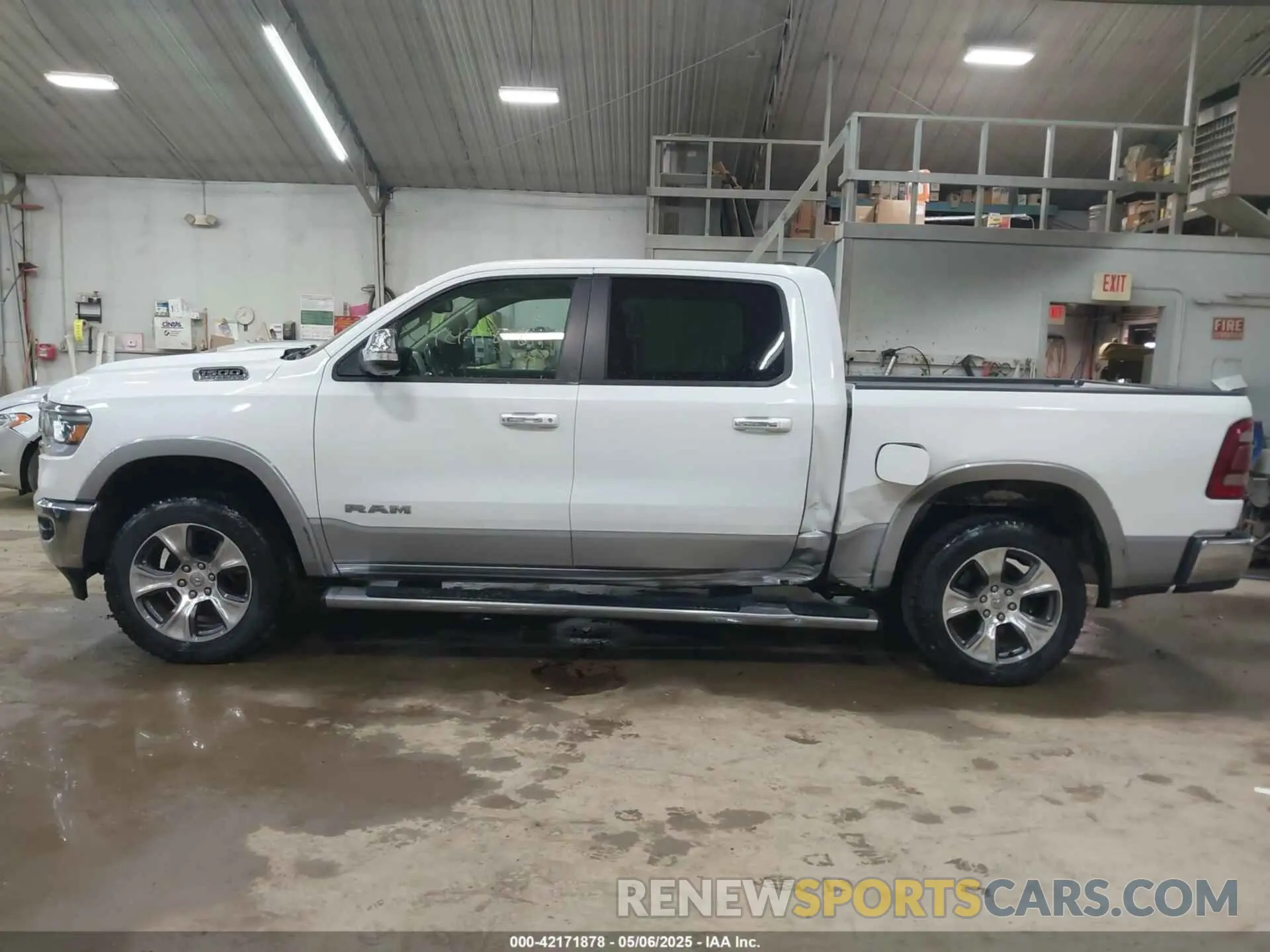 14 Photograph of a damaged car 1C6SRFJT4LN356072 RAM 1500 2020