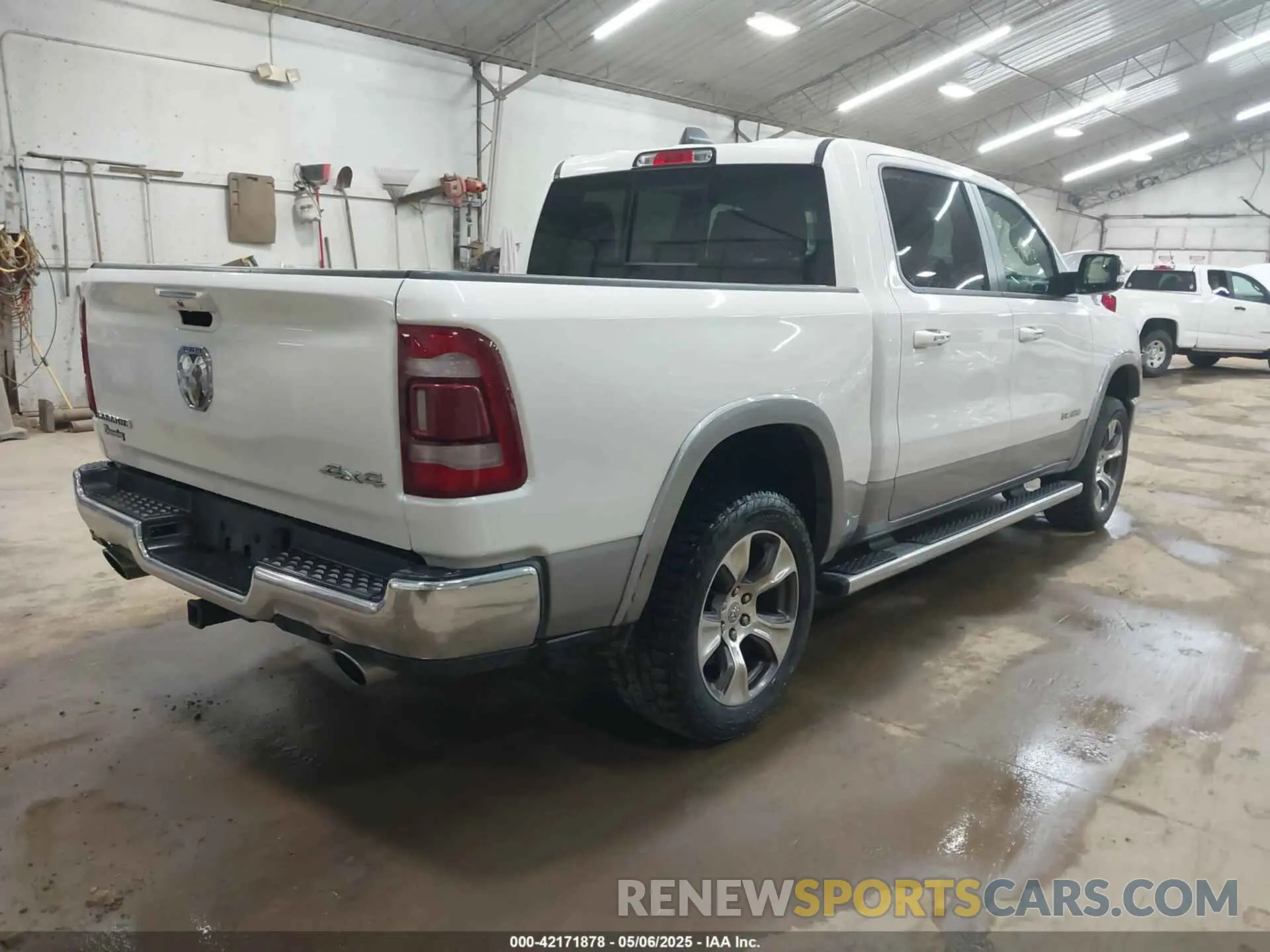4 Photograph of a damaged car 1C6SRFJT4LN356072 RAM 1500 2020